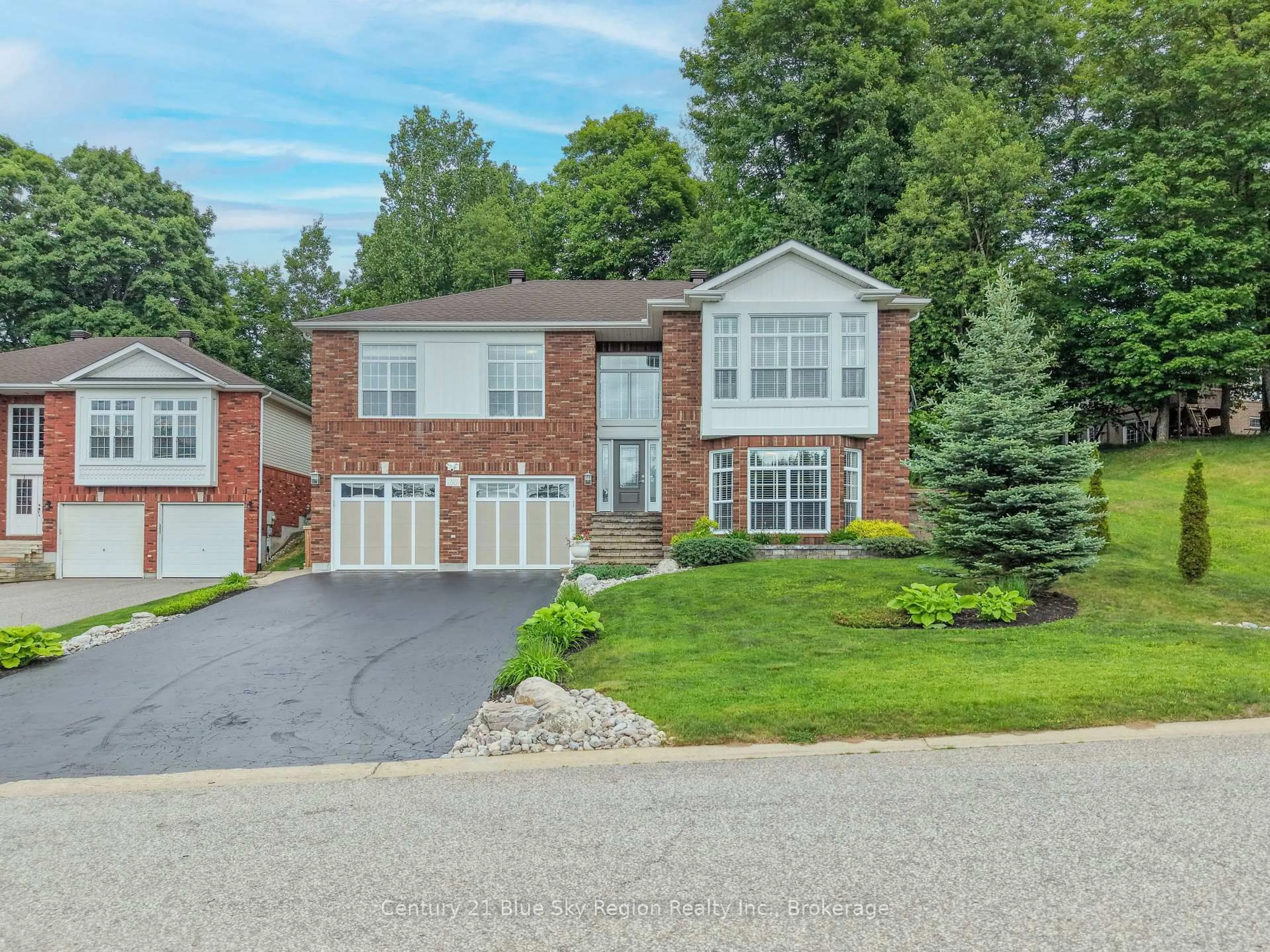 Home with brick exterior material, street for 69 Kenwood Hills Dr, North Bay Ontario P1C 1M3