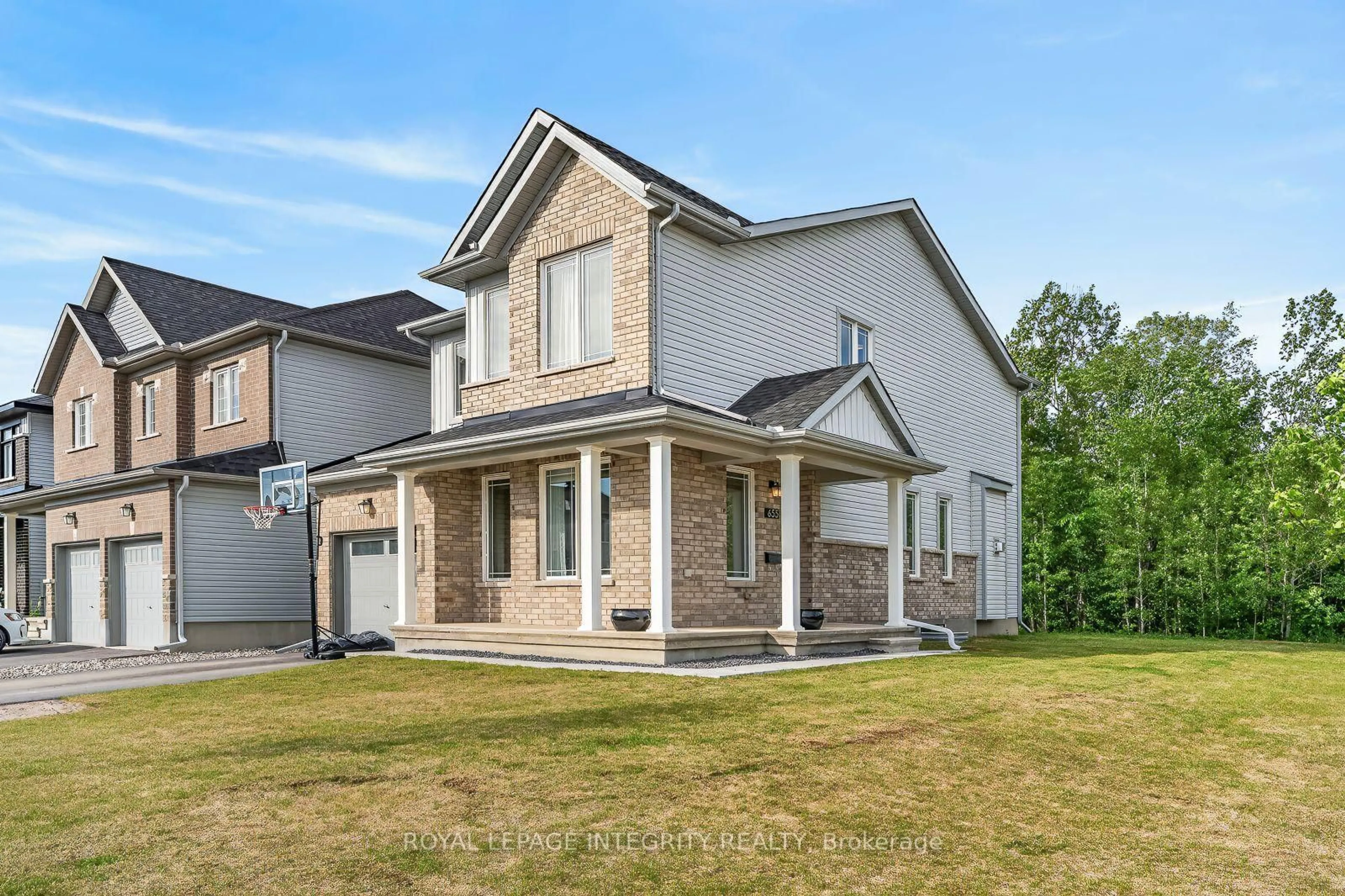 Home with brick exterior material, street for 655 PERSIMMON Way, Ottawa Ontario K1W 0T2