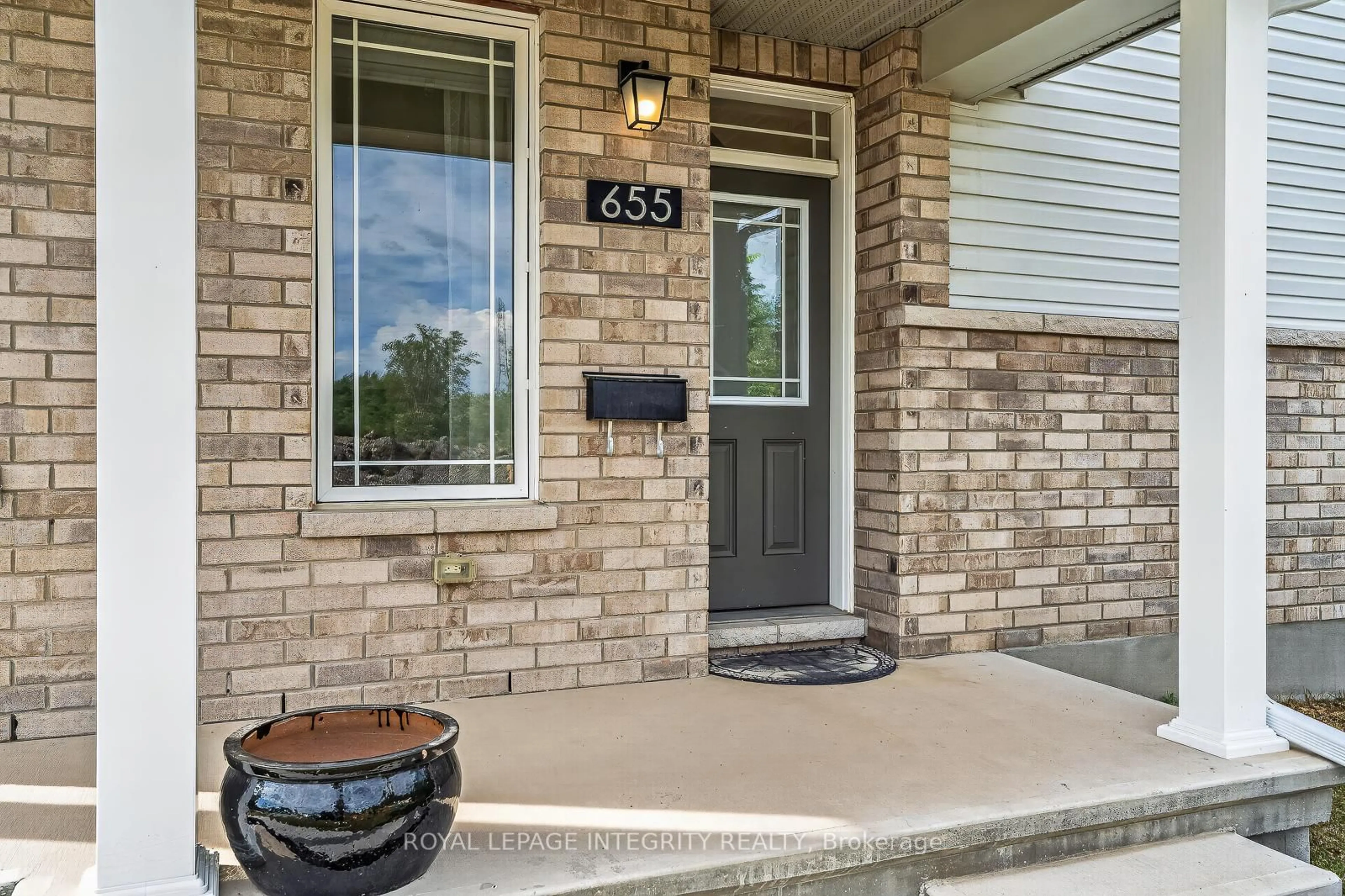 Home with brick exterior material, street for 655 PERSIMMON Way, Ottawa Ontario K1W 0T2