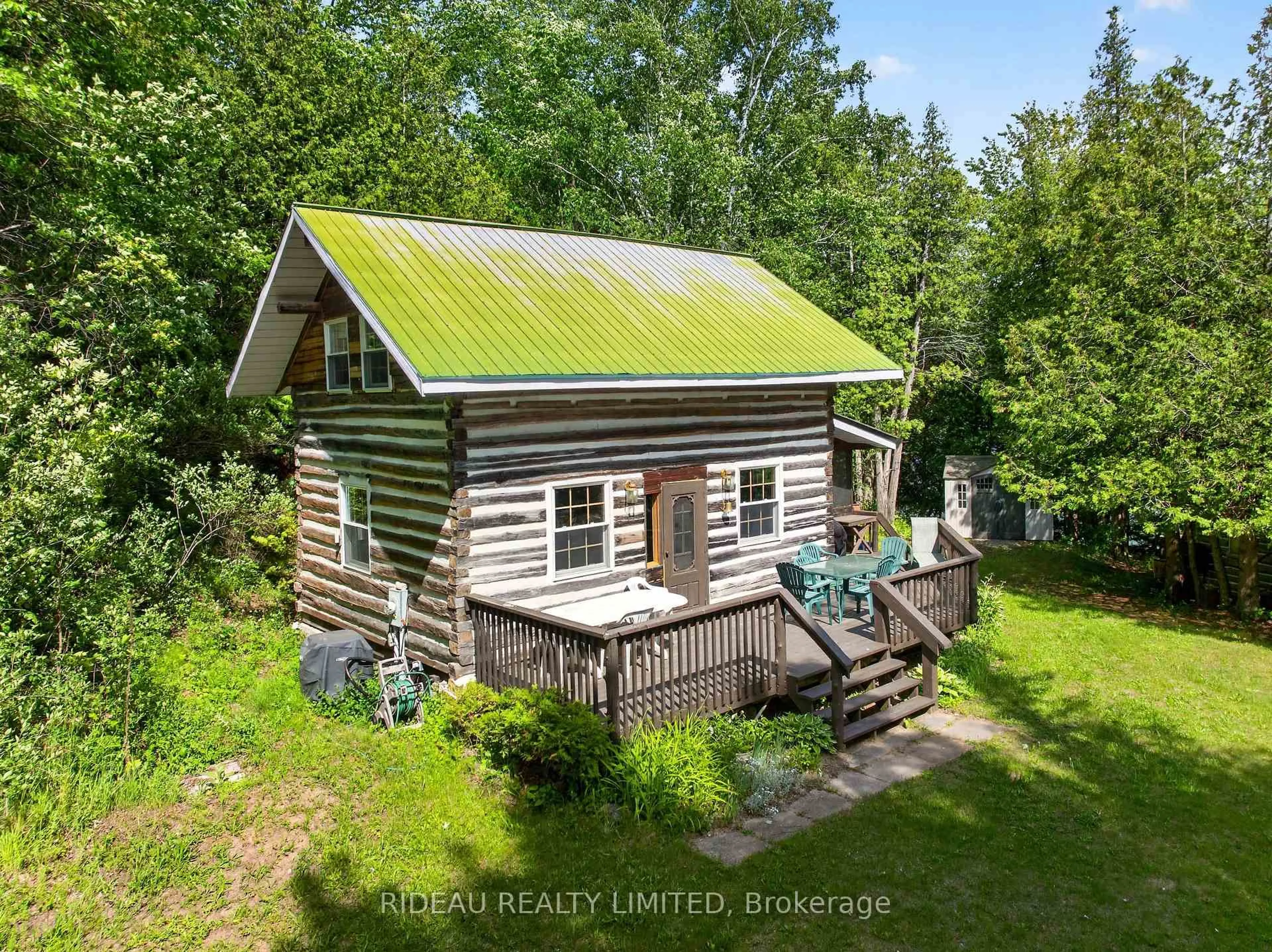 A pic from outside/outdoor area/front of a property/back of a property/a pic from drone, unknown for 114 Bays End Lane, Rideau Lakes Ontario K0G 1V0