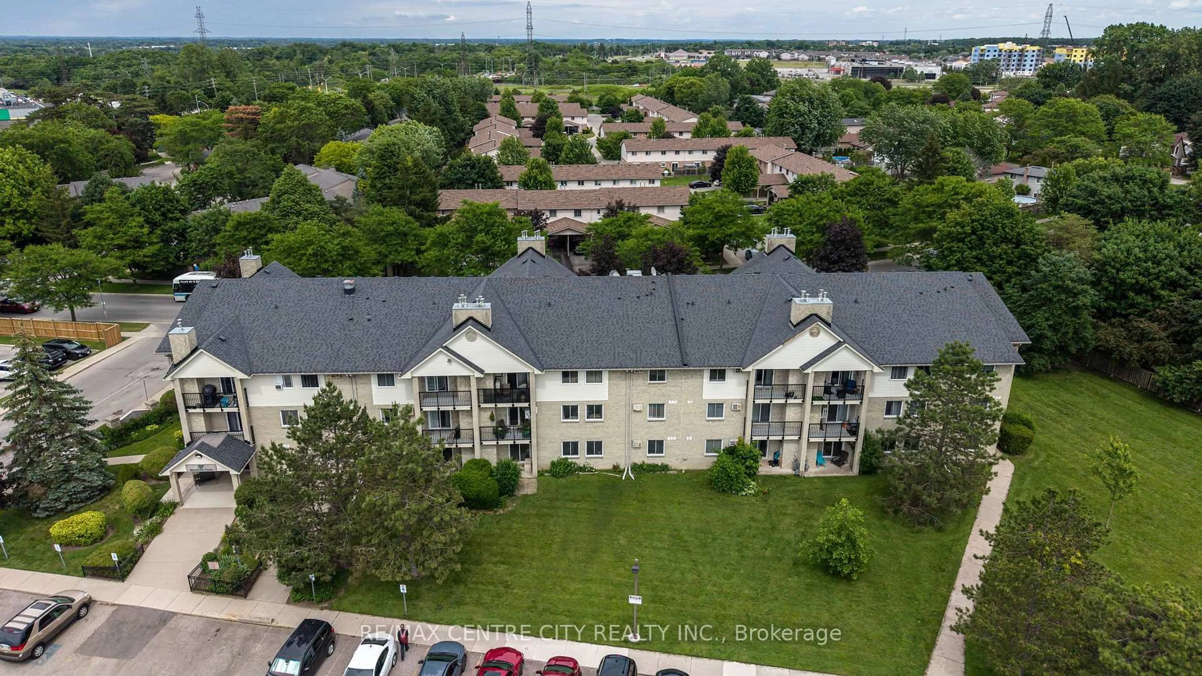 A pic from outside/outdoor area/front of a property/back of a property/a pic from drone, city buildings view from balcony for 729 Deveron Cres #309, London South Ontario N5Z 4X5