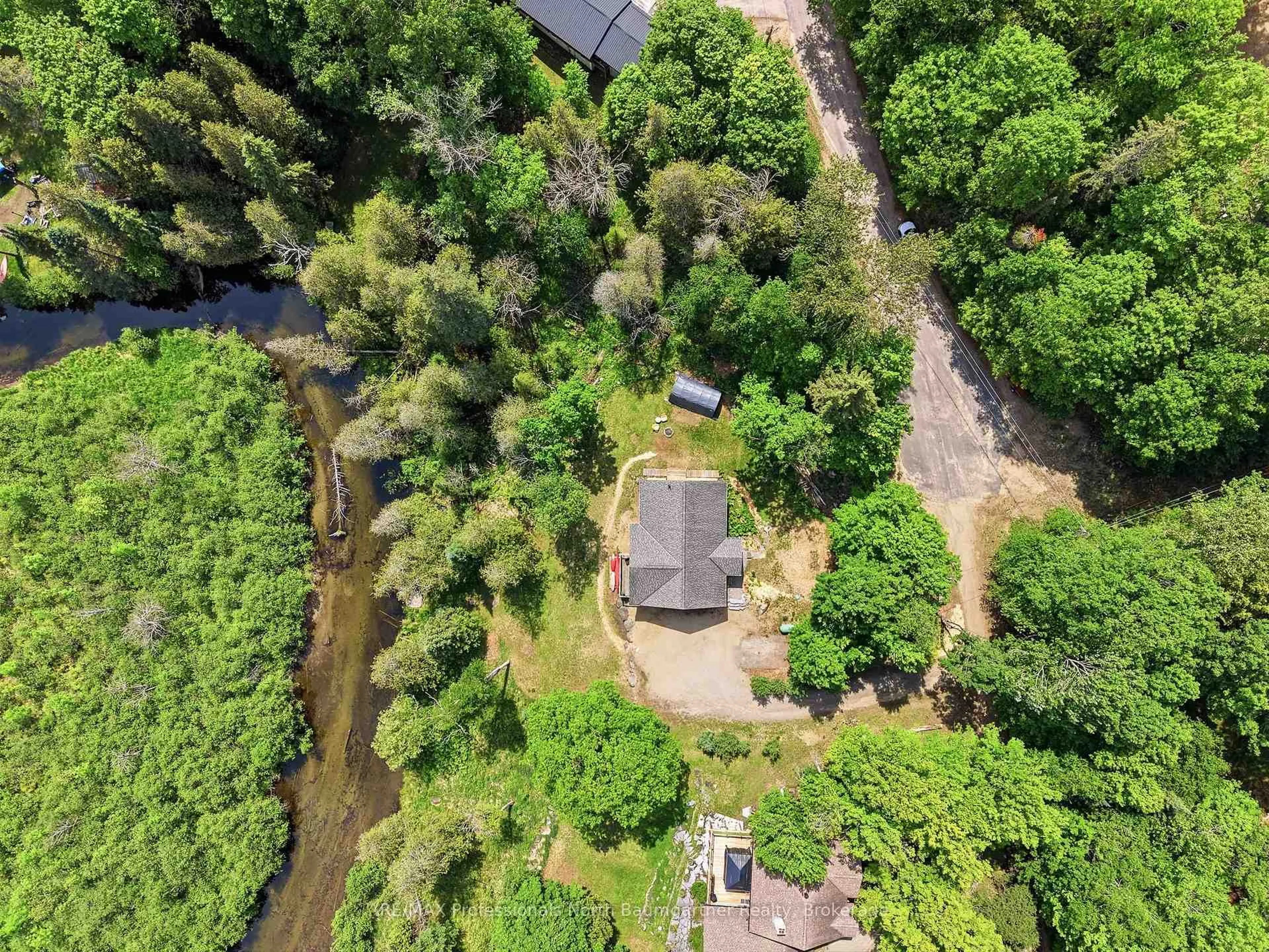 A pic from outside/outdoor area/front of a property/back of a property/a pic from drone, water/lake/river/ocean view for 50 Dean Crt, Dysart et al Ontario K0M 1S0