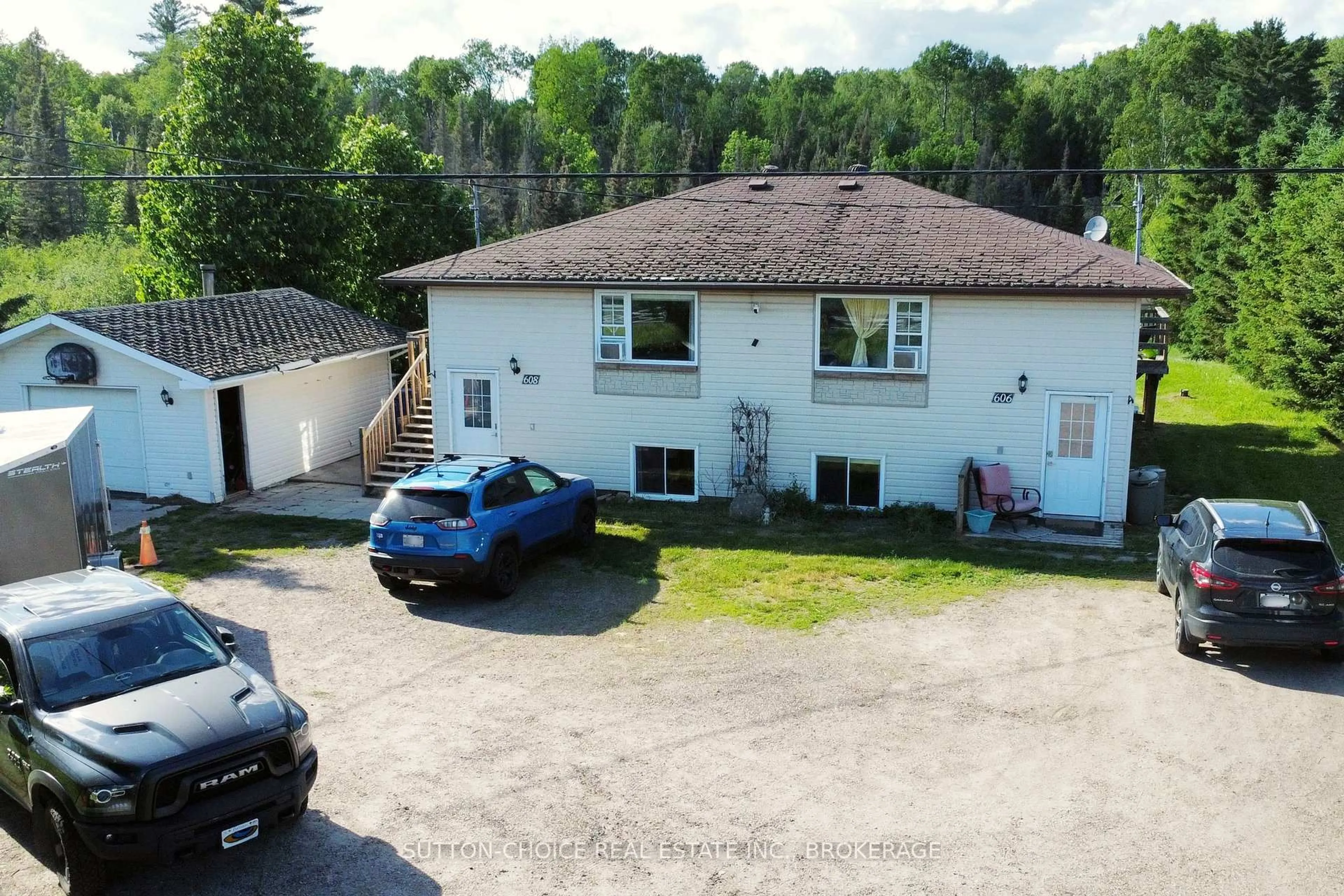 A pic from outside/outdoor area/front of a property/back of a property/a pic from drone, unknown for 606 Highway 94, East Ferris Ontario P0H 1K0