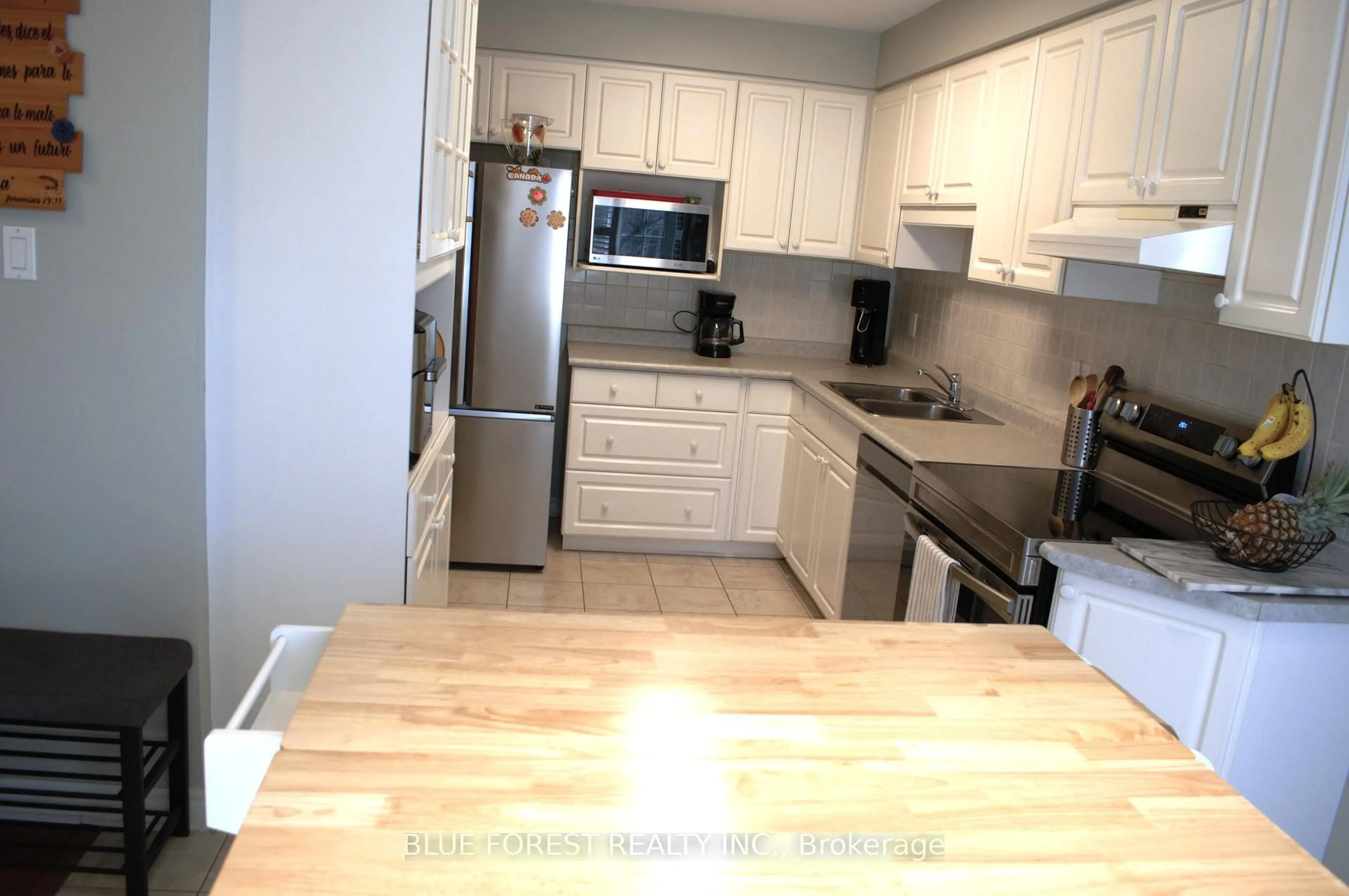Standard kitchen, wood/laminate floor for 410 Ambleside Dr #3, London North Ontario N6G 4Y3