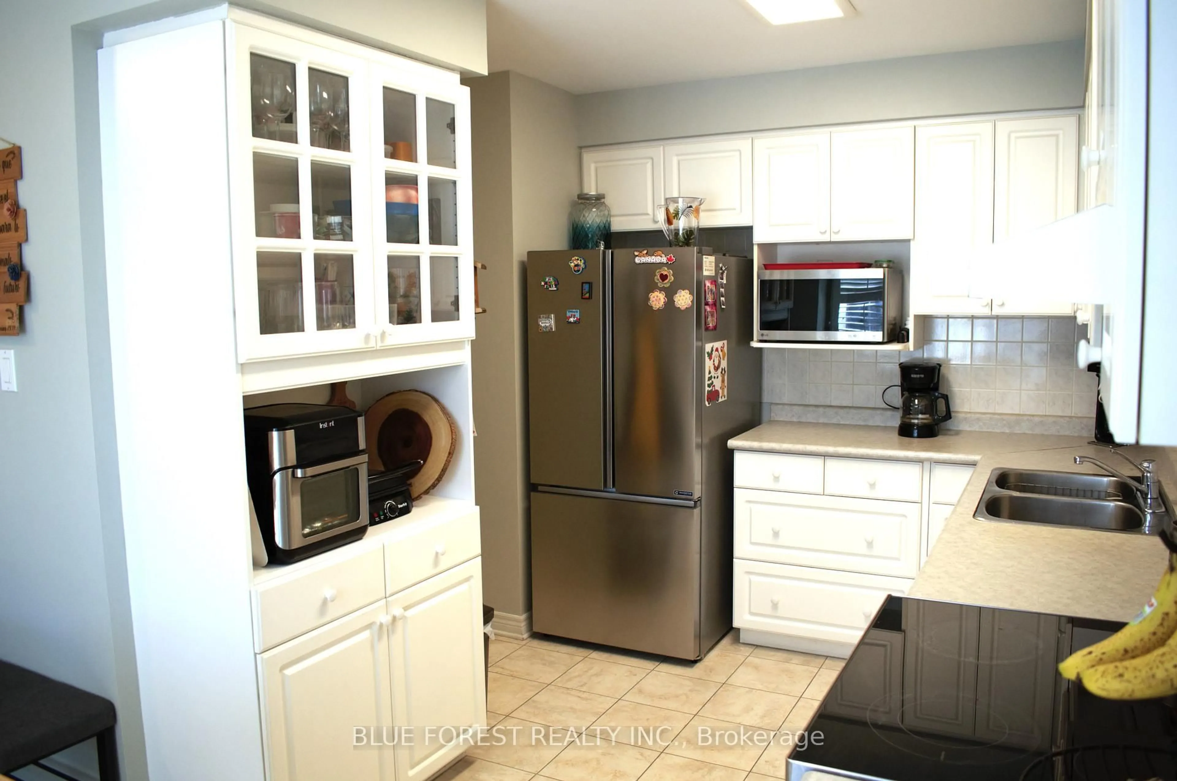 Standard kitchen, ceramic/tile floor for 410 Ambleside Dr #3, London North Ontario N6G 4Y3