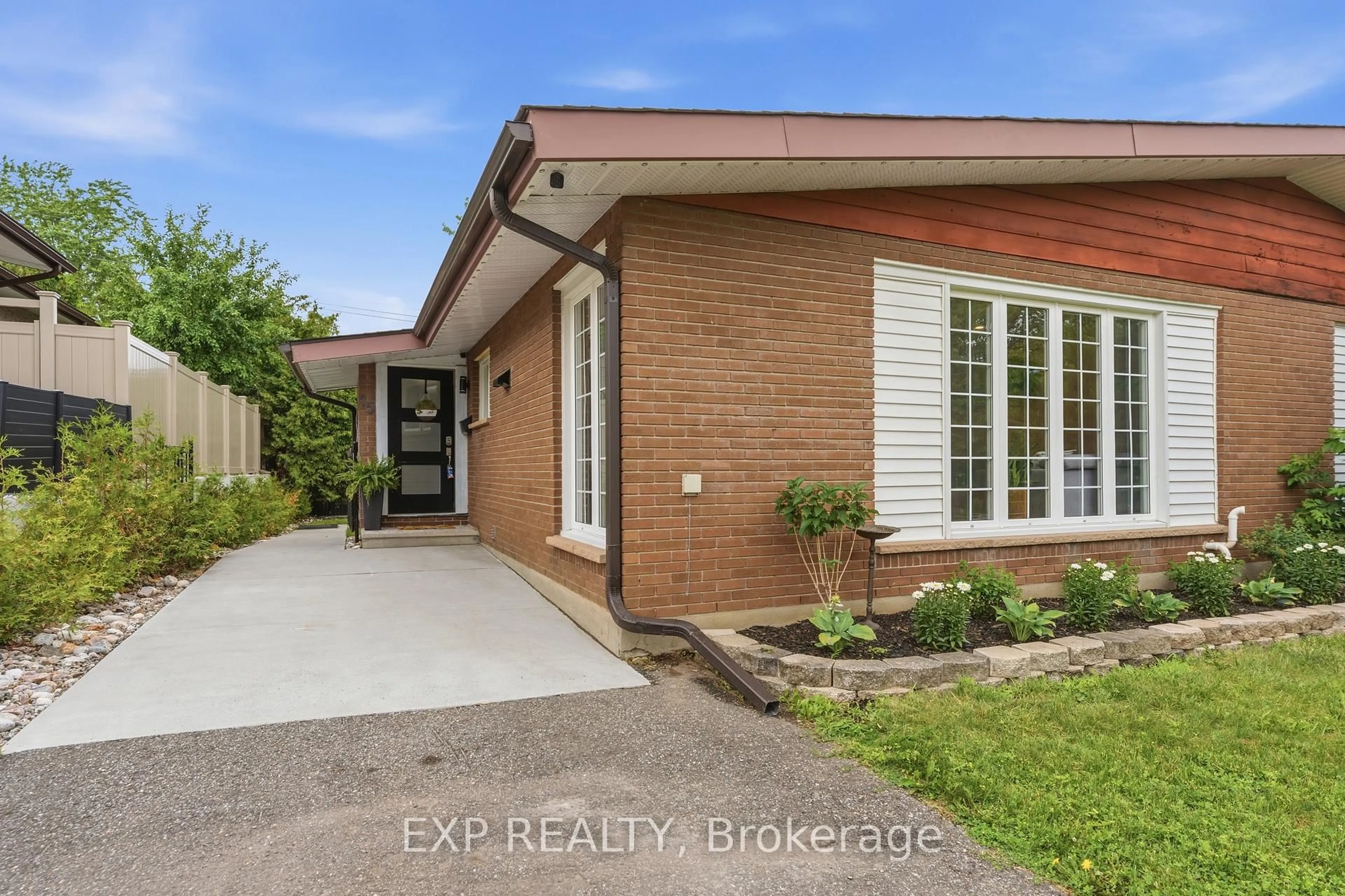 Home with brick exterior material, street for 15 Newbury Ave, Ottawa Ontario K2E 6K7