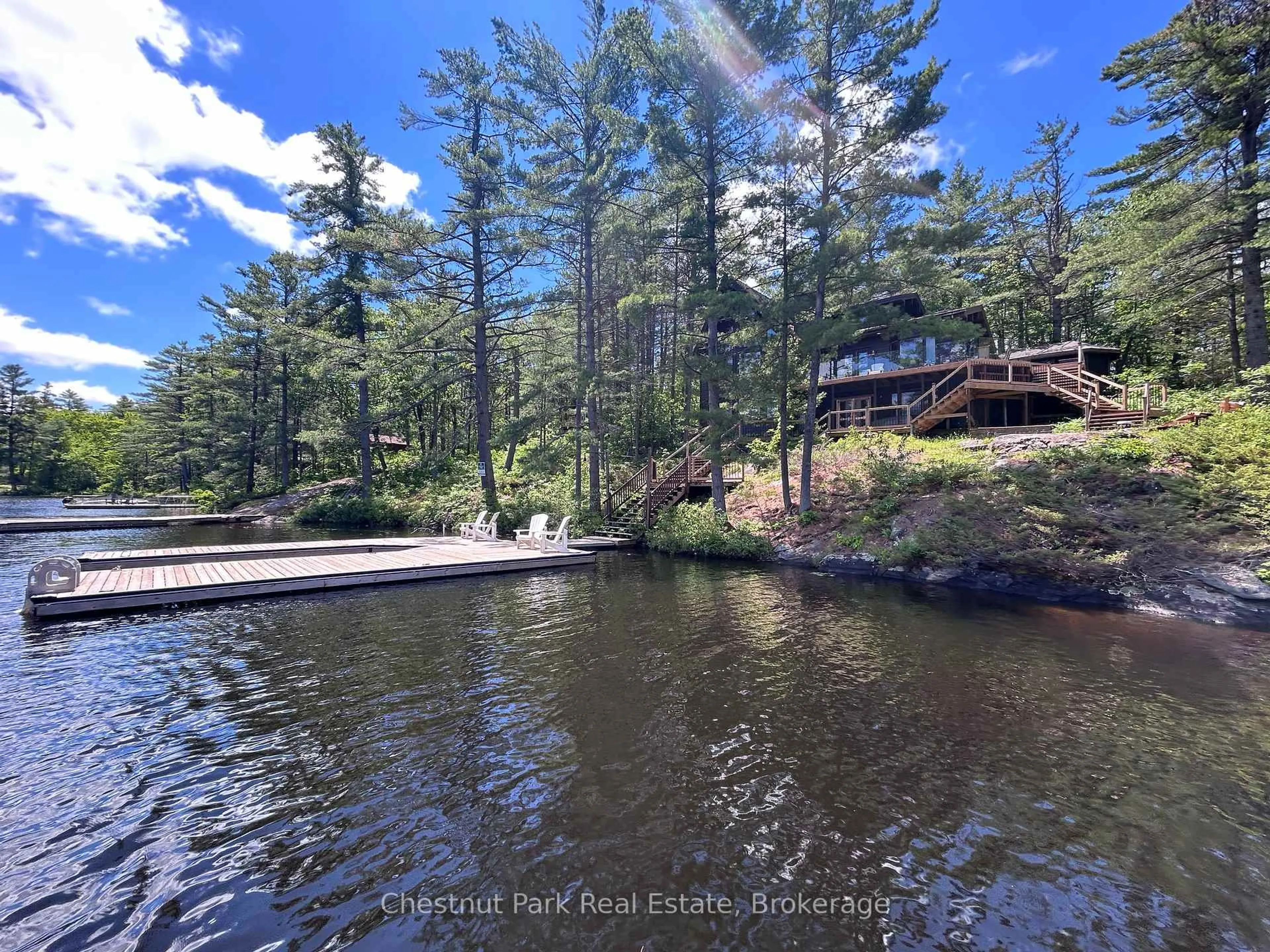 A pic from outside/outdoor area/front of a property/back of a property/a pic from drone, water/lake/river/ocean view for 5600 Kahshe Lake, Gravenhurst Ontario P1P 1R6