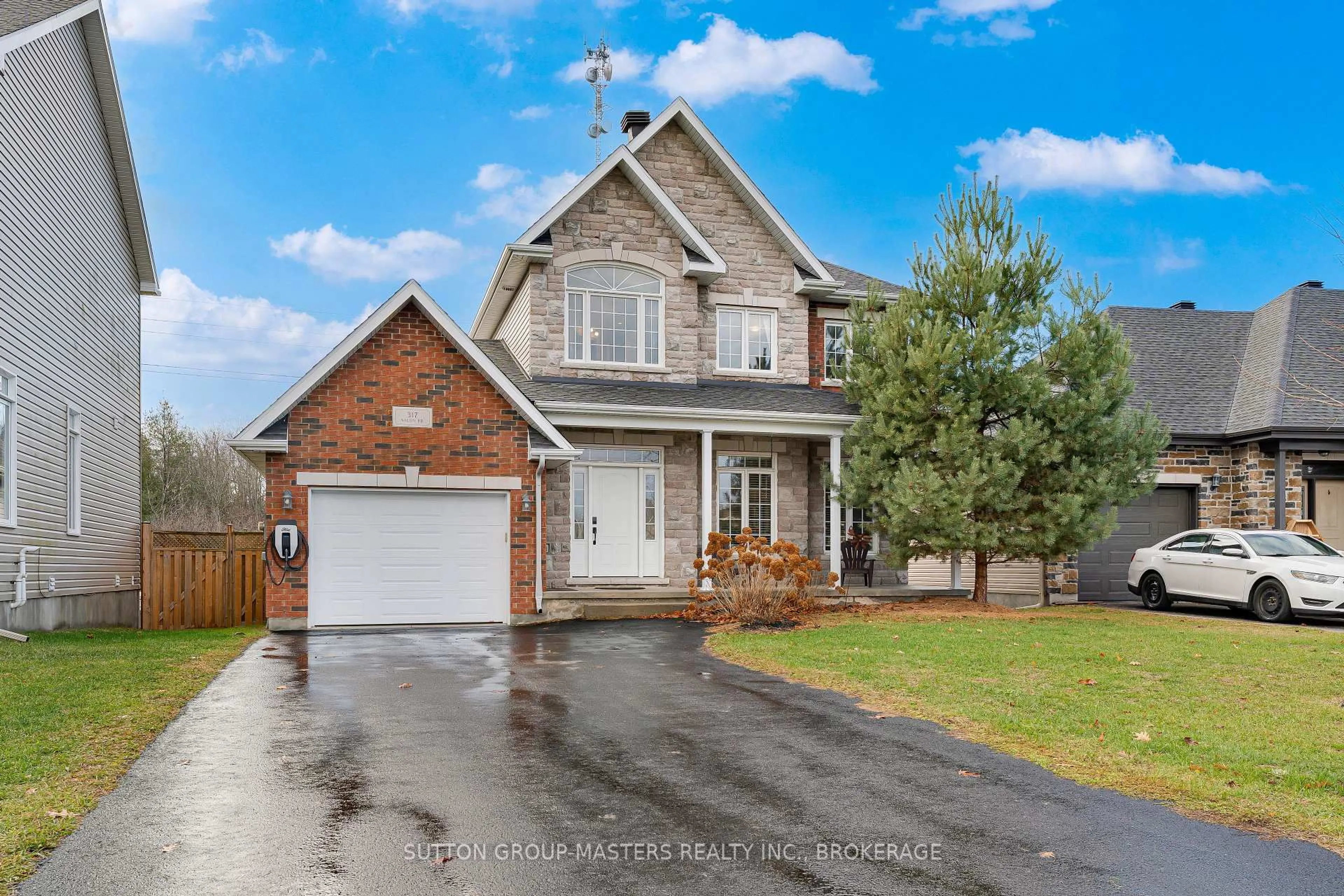 Home with brick exterior material, street for 317 Nalon Rd, Gananoque Ontario K7G 0A3