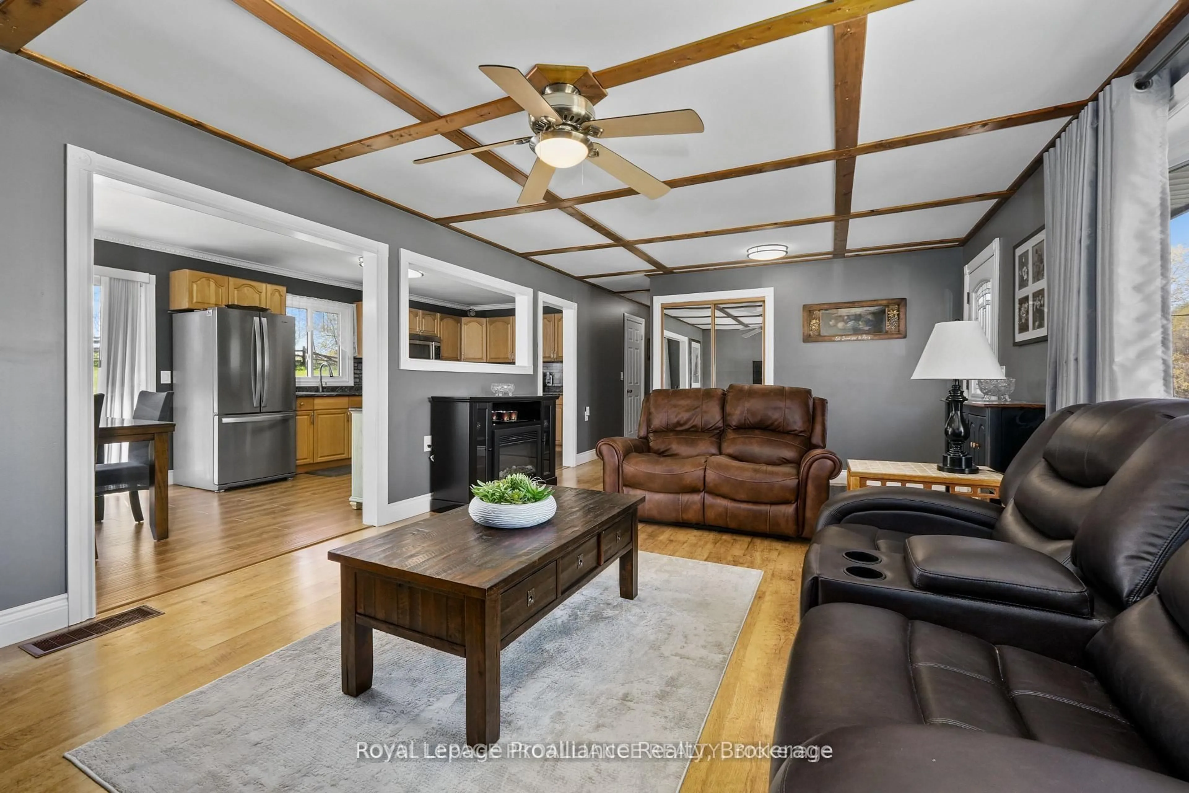 Living room with furniture, wood/laminate floor for 7755 County Road 45, Alnwick/Haldimand Ontario K0K 2X0