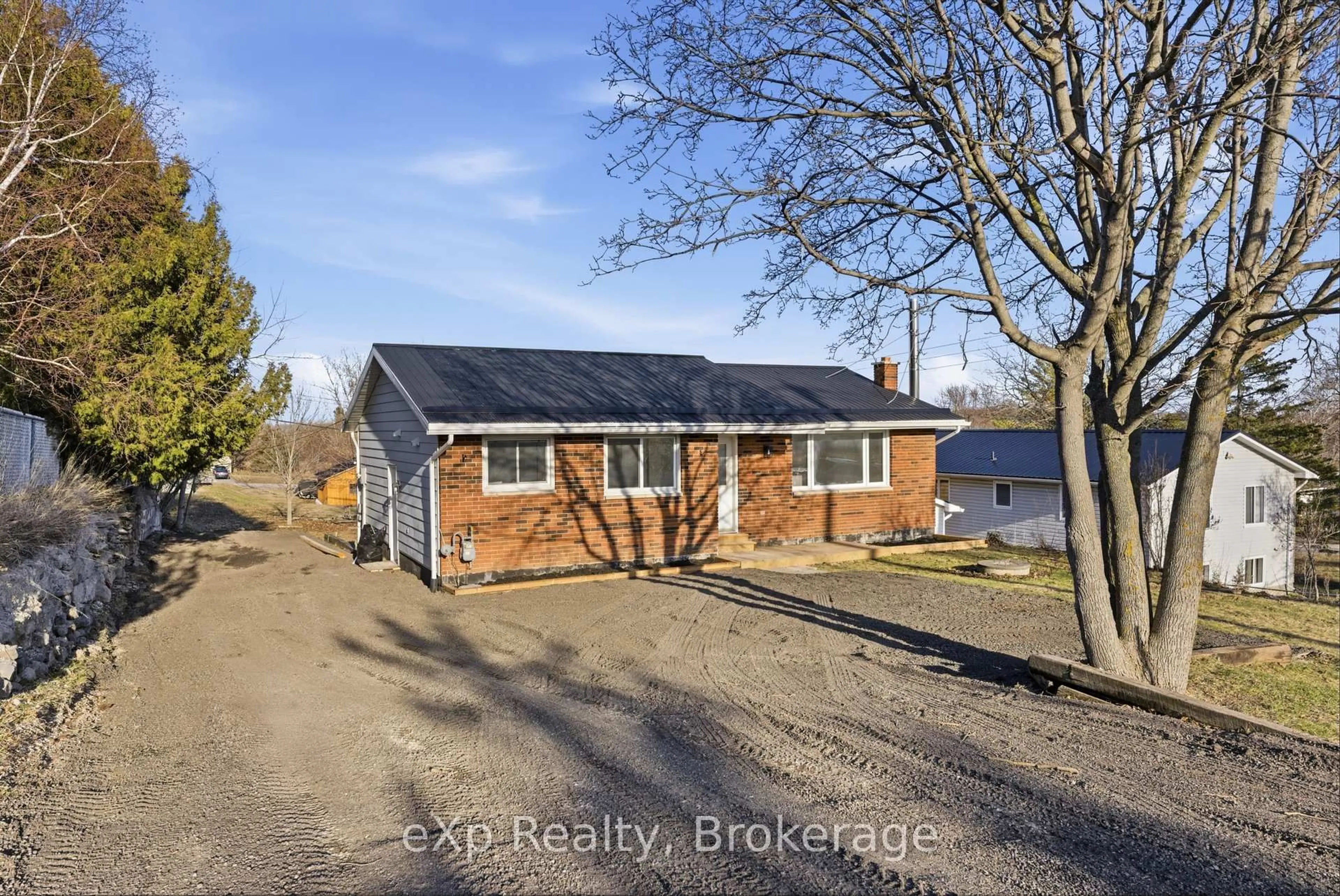A pic from outside/outdoor area/front of a property/back of a property/a pic from drone, street for 696 Whites Rd, Trenton Ontario K8V 5P8