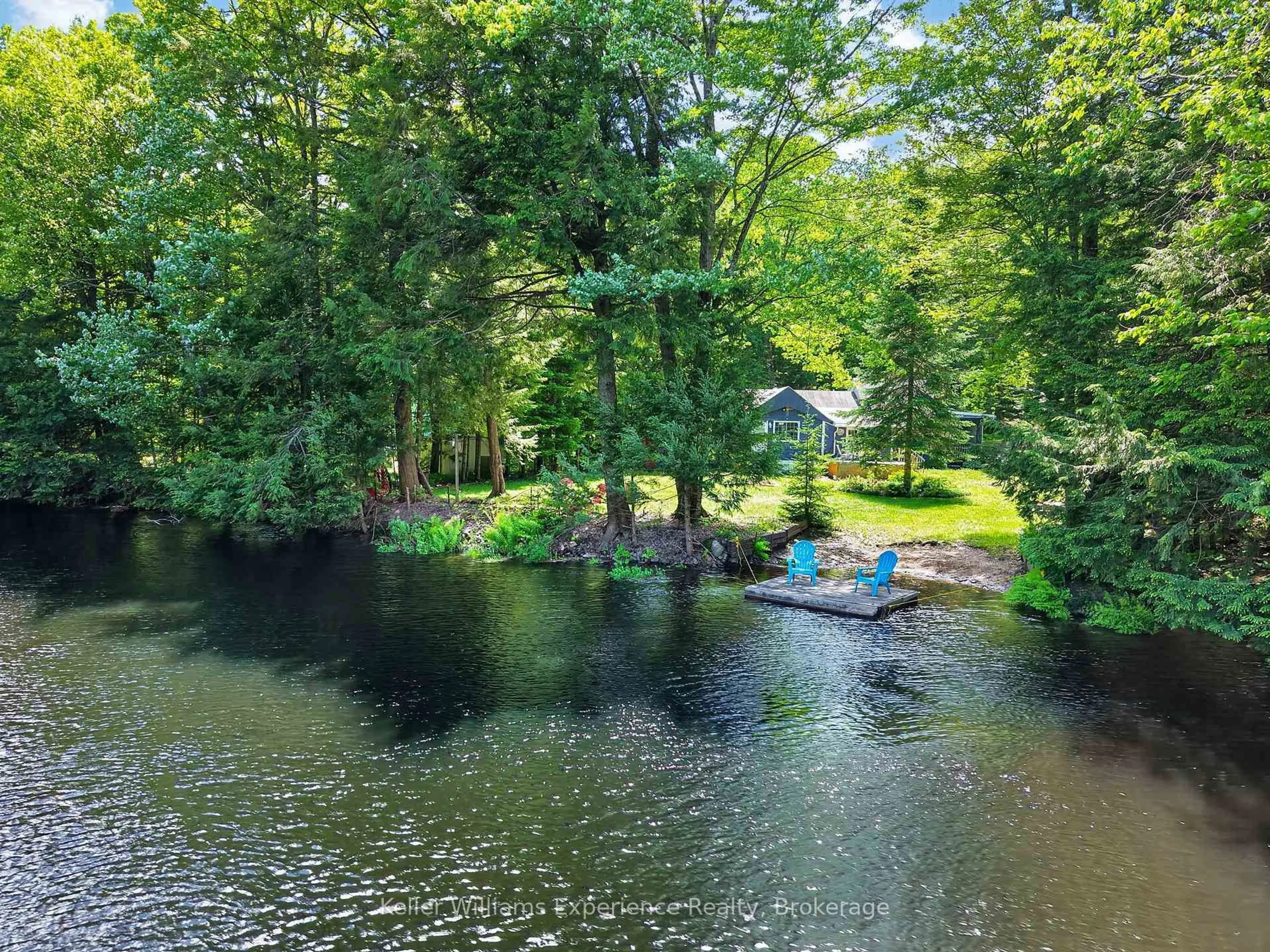 A pic from outside/outdoor area/front of a property/back of a property/a pic from drone, water/lake/river/ocean view for 1133 Sherwood Forest Rd, Bracebridge Ontario P1L 1X3