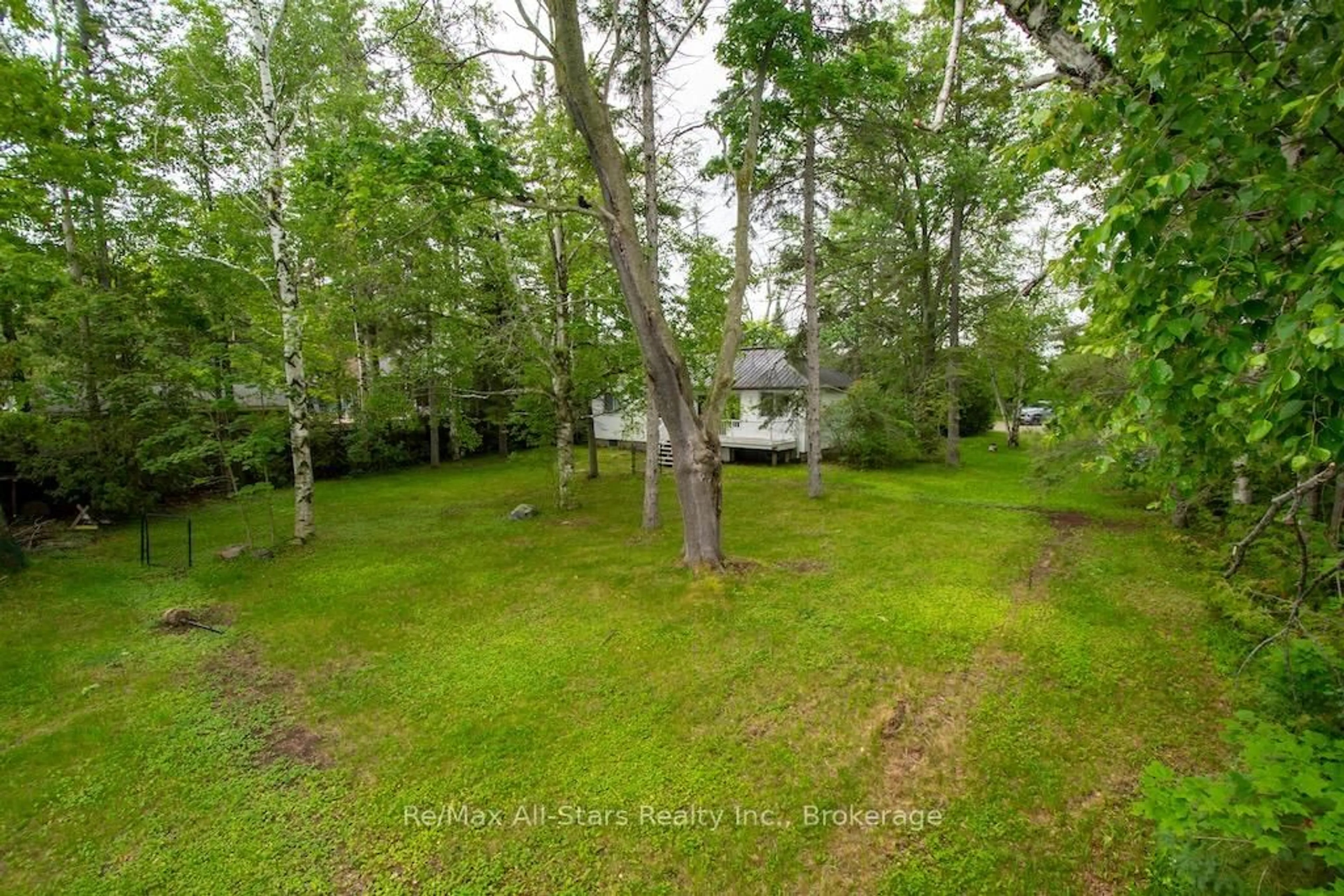 A pic from outside/outdoor area/front of a property/back of a property/a pic from drone, forest/trees view for 91 Trinity Dr, Kawartha Lakes Ontario K0M 1N0