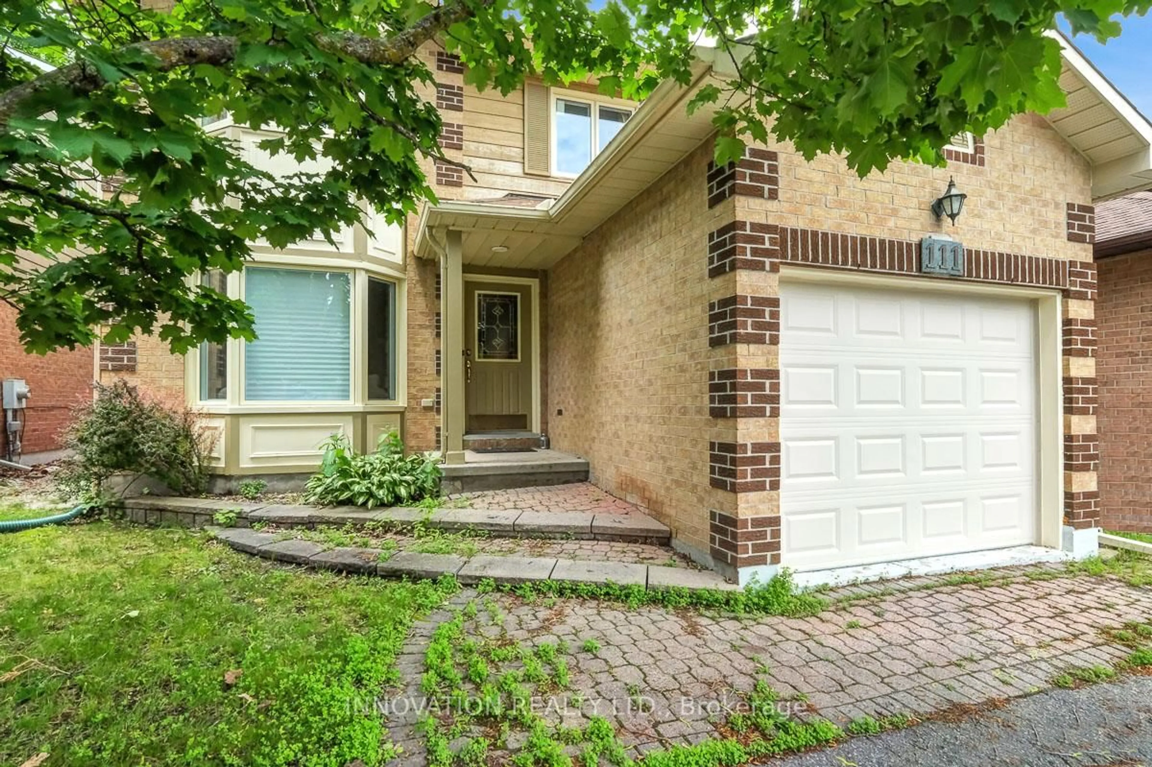 Home with brick exterior material, street for 111 Beechfern Dr, Stittsville Ontario K2S 1E3