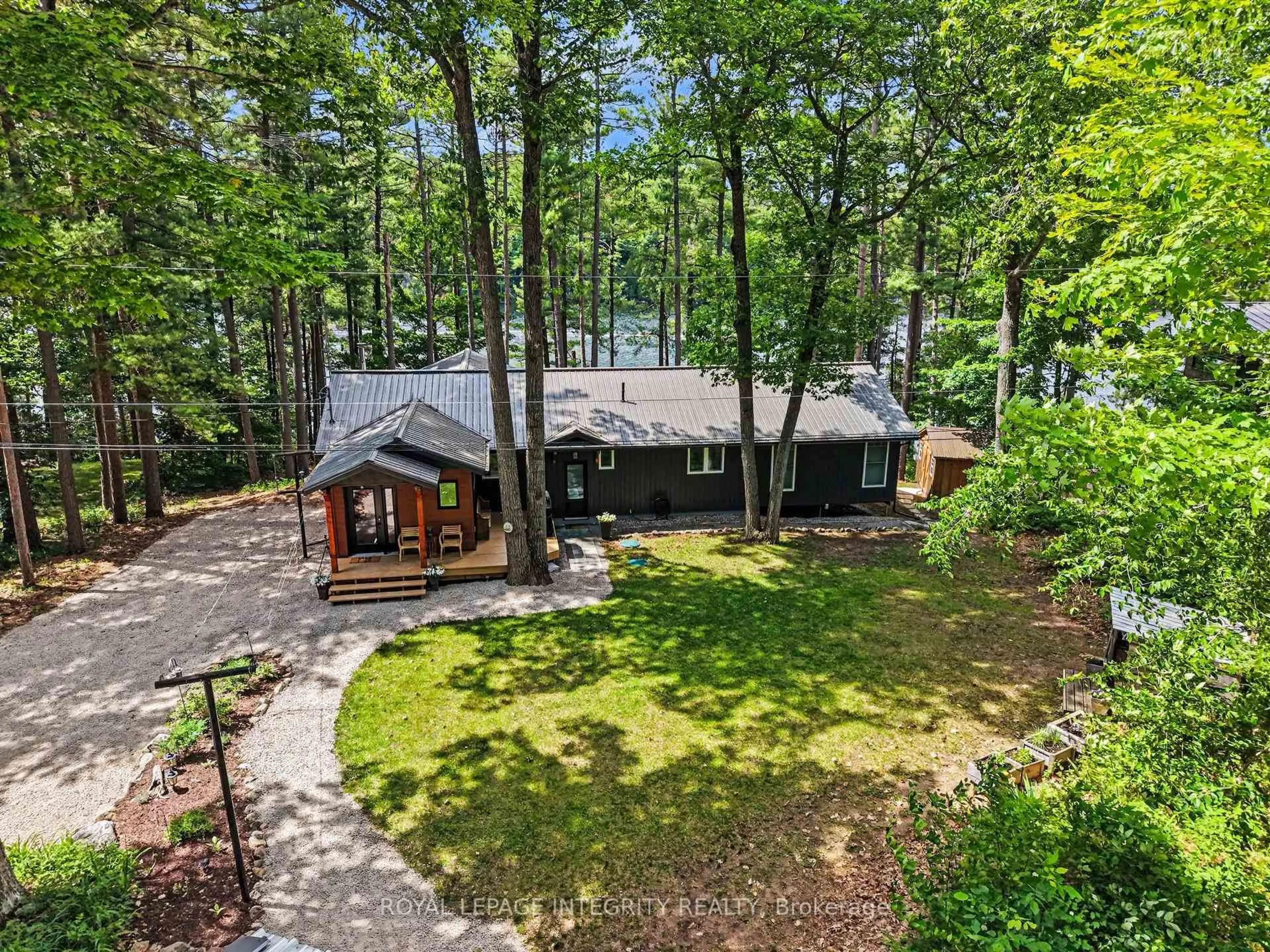 A pic from outside/outdoor area/front of a property/back of a property/a pic from drone, water/lake/river/ocean view for 185 Christie Lake Lane 51 Lane, Maberly Ontario K0H 2B0