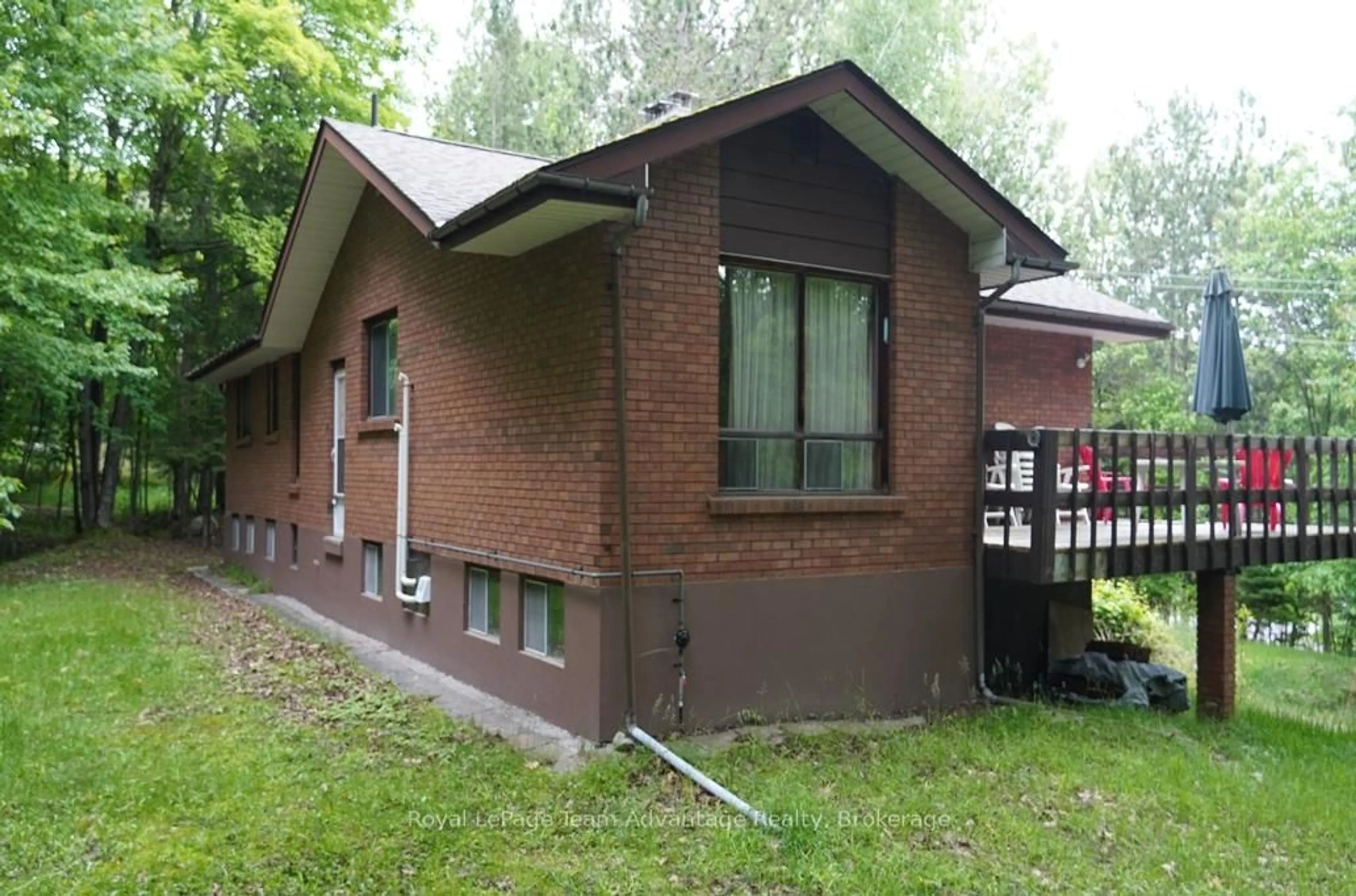 Home with brick exterior material, building for 49 Bayview Dr, Carling Ontario P0G 1G0