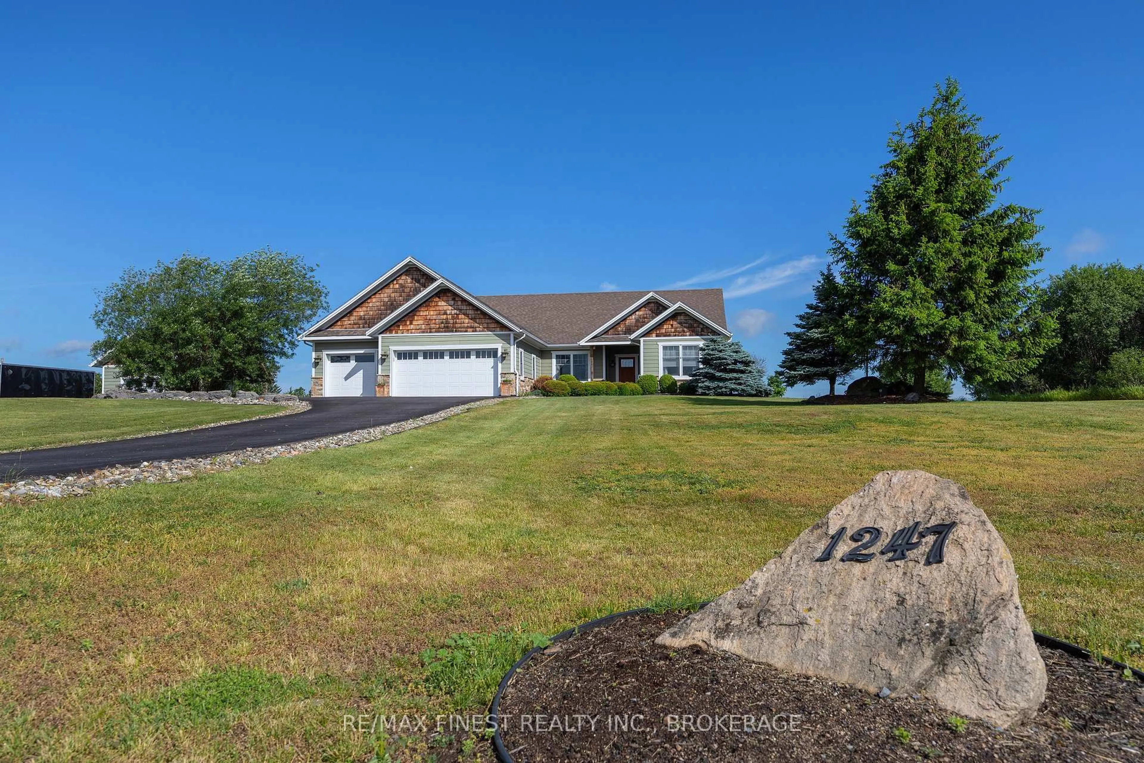 A pic from outside/outdoor area/front of a property/back of a property/a pic from drone, water/lake/river/ocean view for 1247 Millhaven Rd, Bissett Creek Ontario K0H 2H0