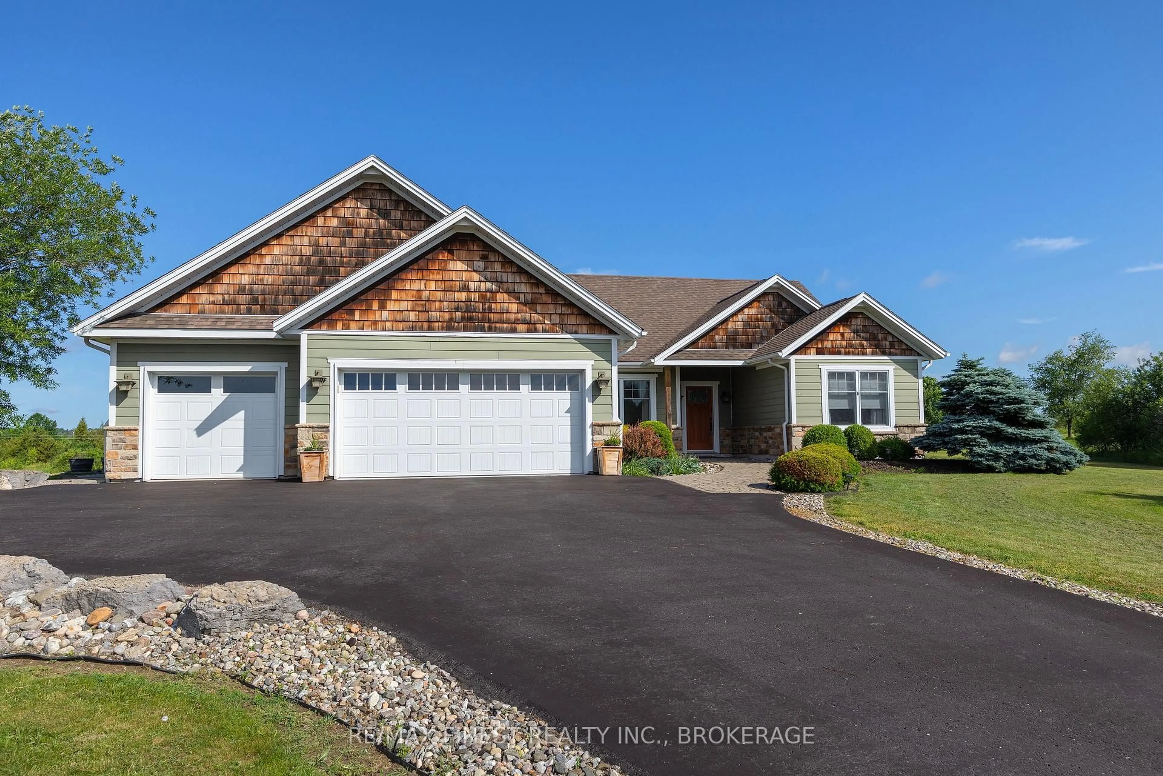 Home with vinyl exterior material, street for 1247 Millhaven Rd, Bissett Creek Ontario K0H 2H0