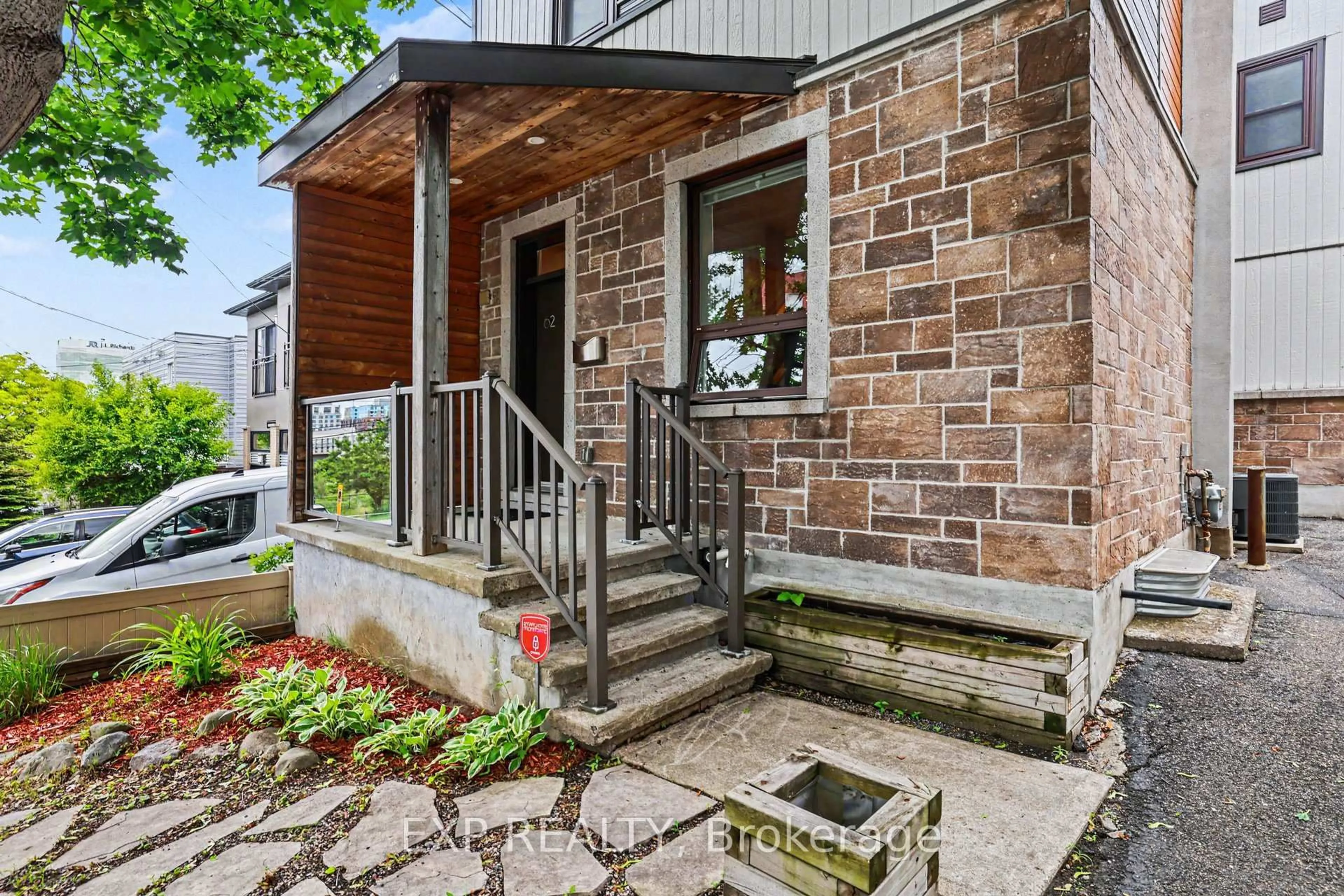 Home with brick exterior material, street for 62 Young St, Ottawa Ontario K1S 3H9