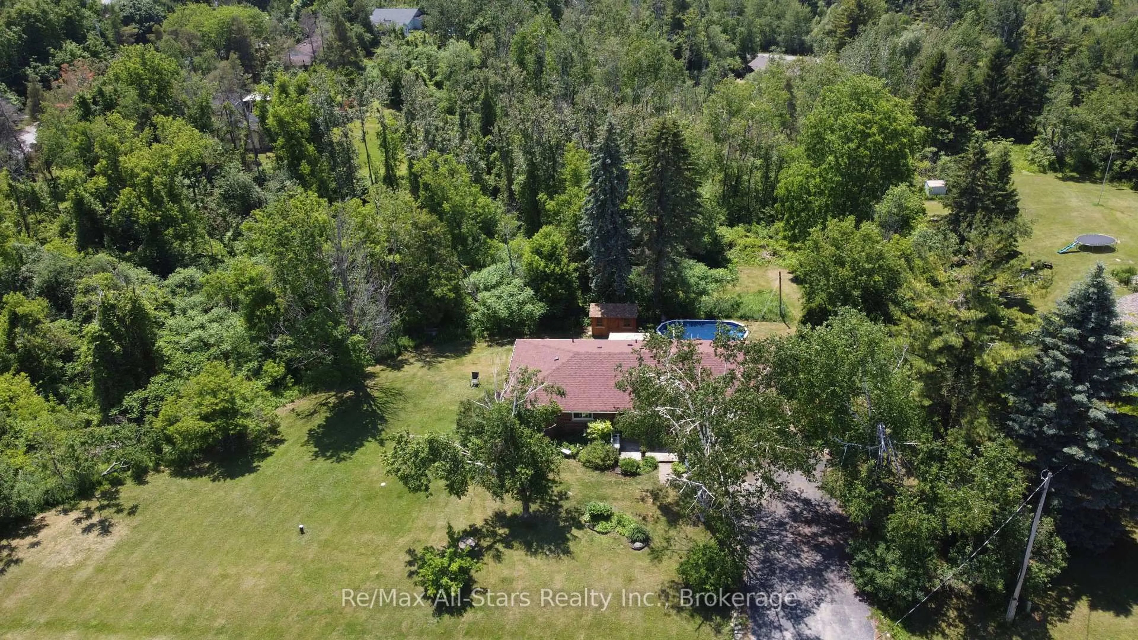 A pic from outside/outdoor area/front of a property/back of a property/a pic from drone, forest/trees view for 14 Valley Rd, Cavan Monaghan Ontario L0A 1G0