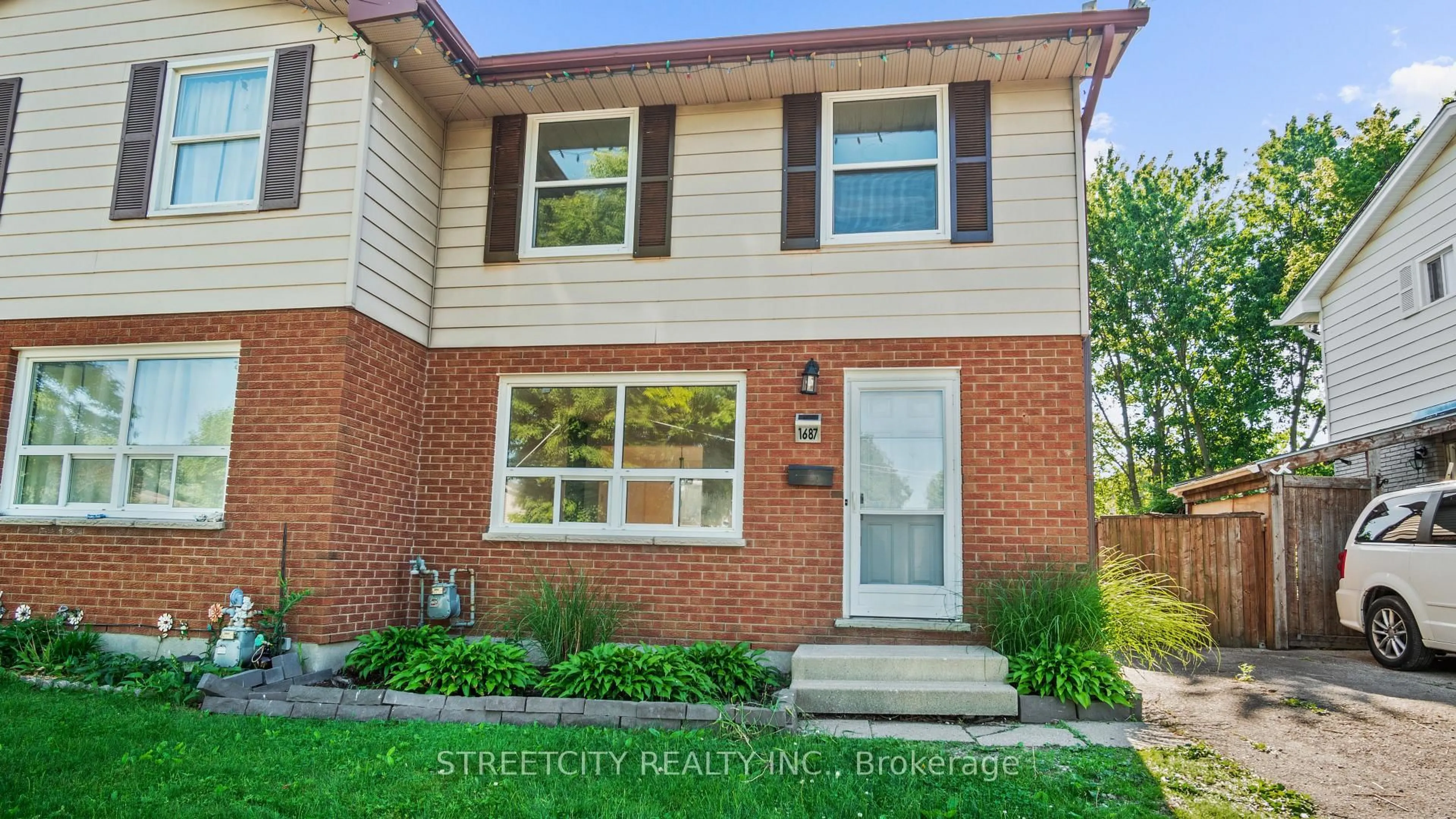 Home with brick exterior material, street for 1687 Ernest Ave, London South Ontario N6E 2S3