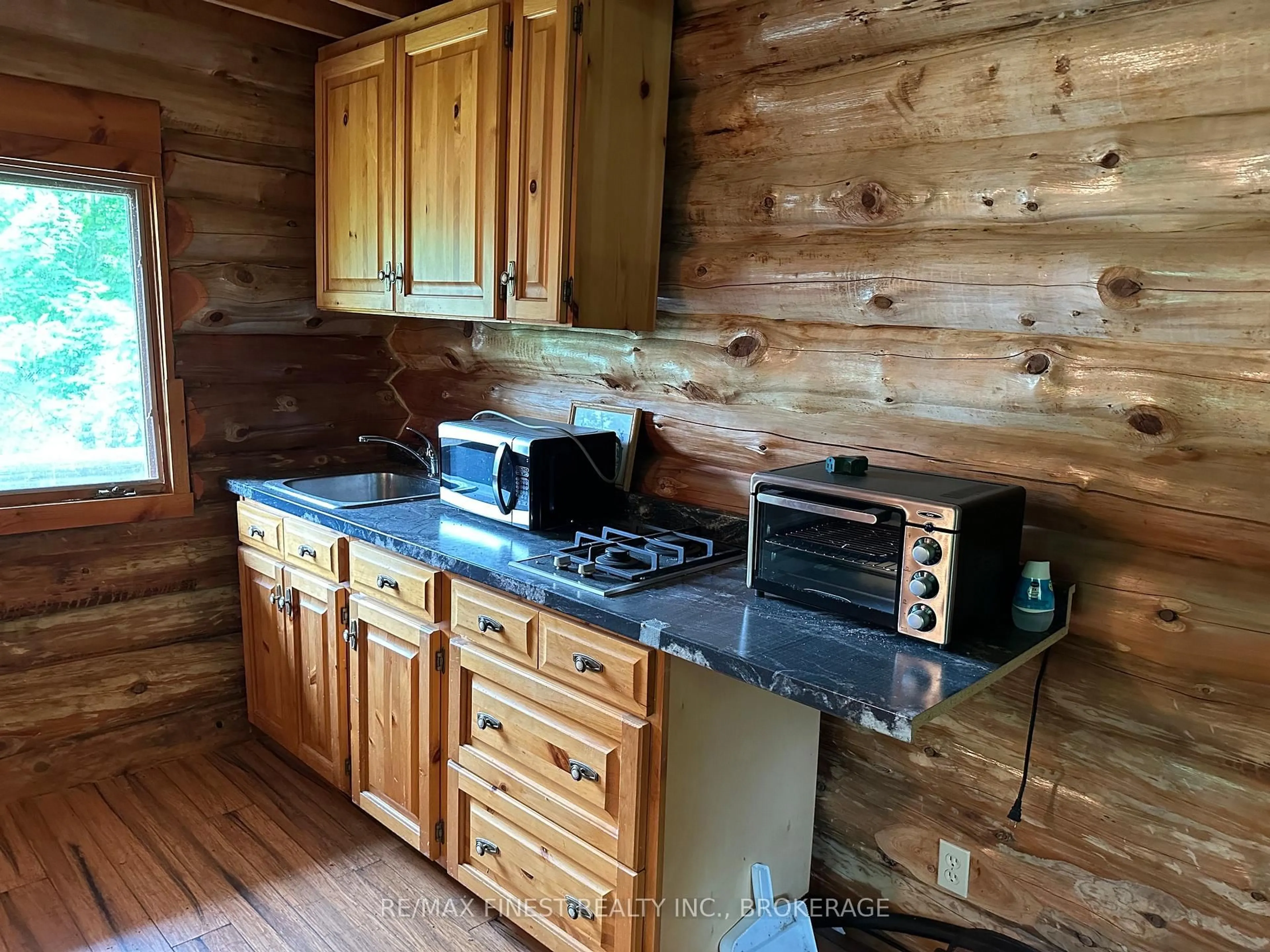 Standard kitchen, wood/laminate floor for 1213 Clement Rd, Sharbot Lake Ontario K0H 2P0