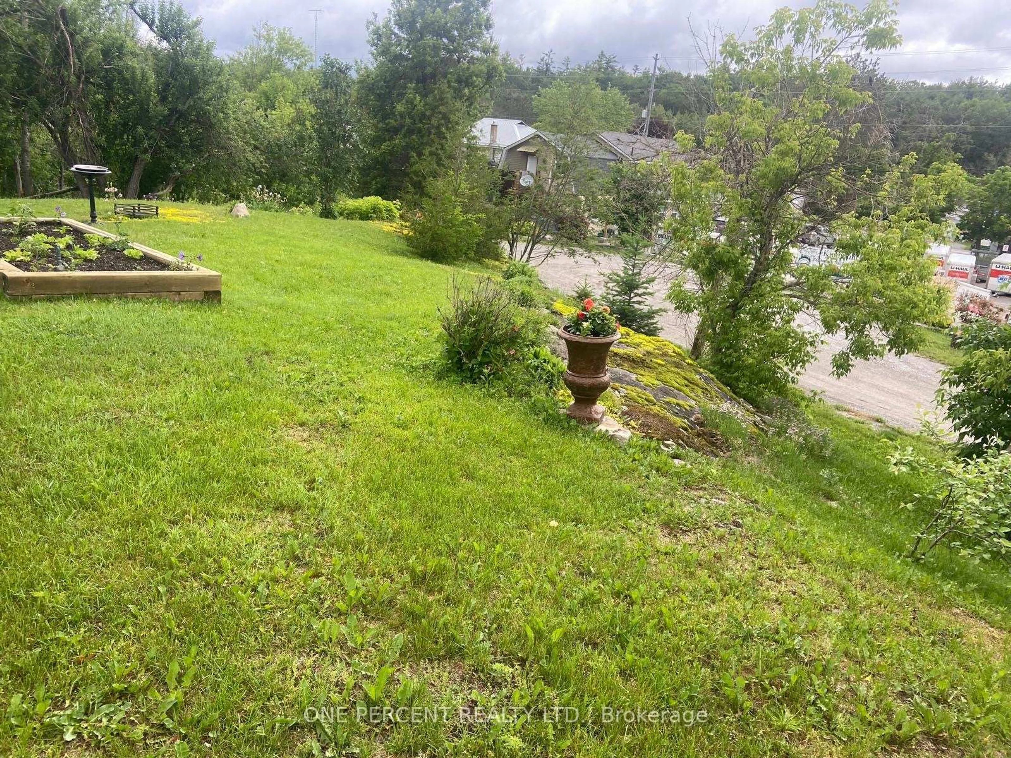 A pic from outside/outdoor area/front of a property/back of a property/a pic from drone, water/lake/river/ocean view for 4982 Monck Rd, Kawartha Lakes Ontario K0M 2A0