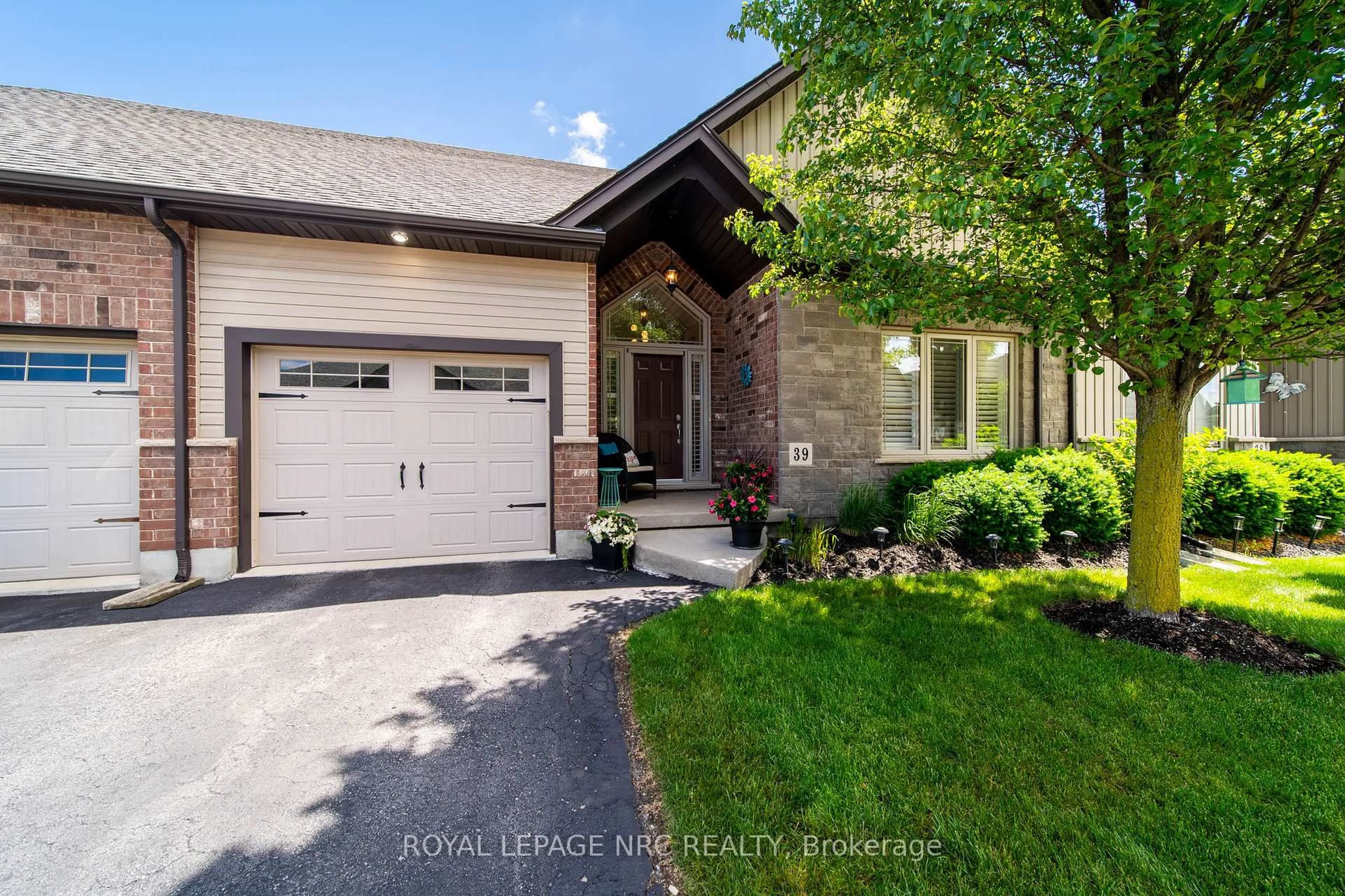 Home with brick exterior material, street for 9440 EAGLE RIDGE Dr #39, Niagara Falls Ontario L2H 0G6