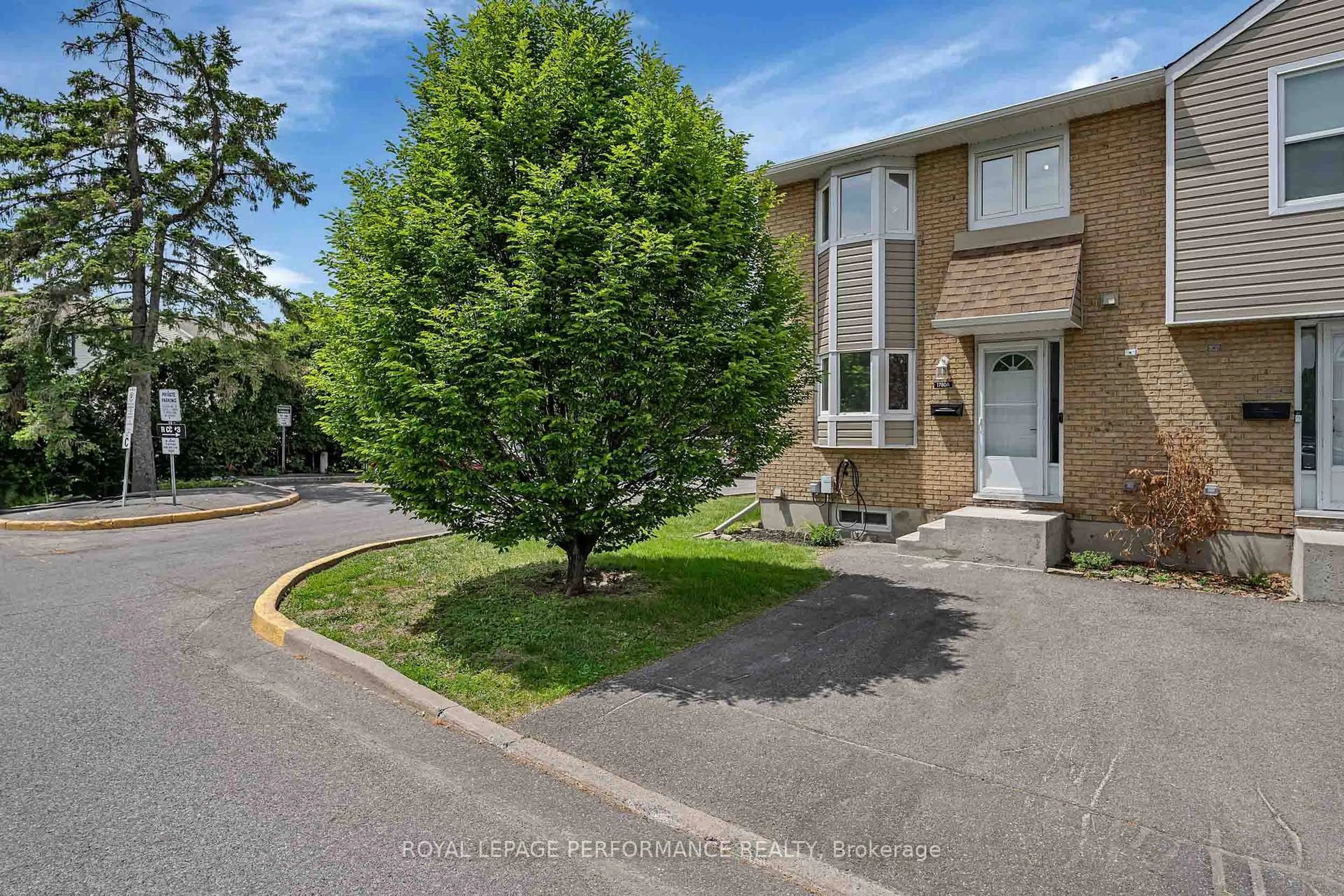 A pic from outside/outdoor area/front of a property/back of a property/a pic from drone, street for 1780 Lamoureux Dr #A, Ottawa Ontario K1E 2N4