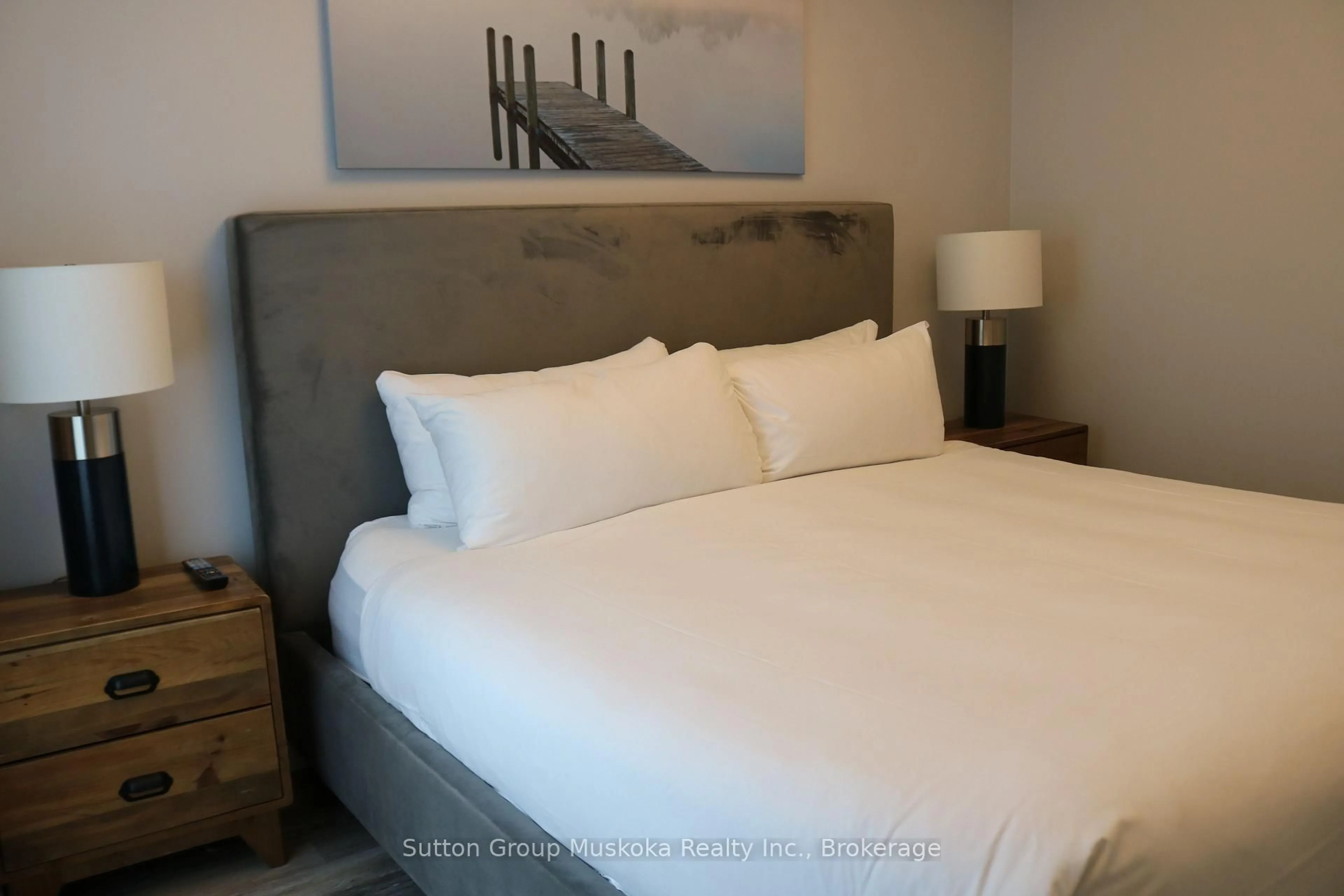 Bedroom with bed, unknown for 25 Pen Lake Point Rd #208, Huntsville Ontario P1H 1A9