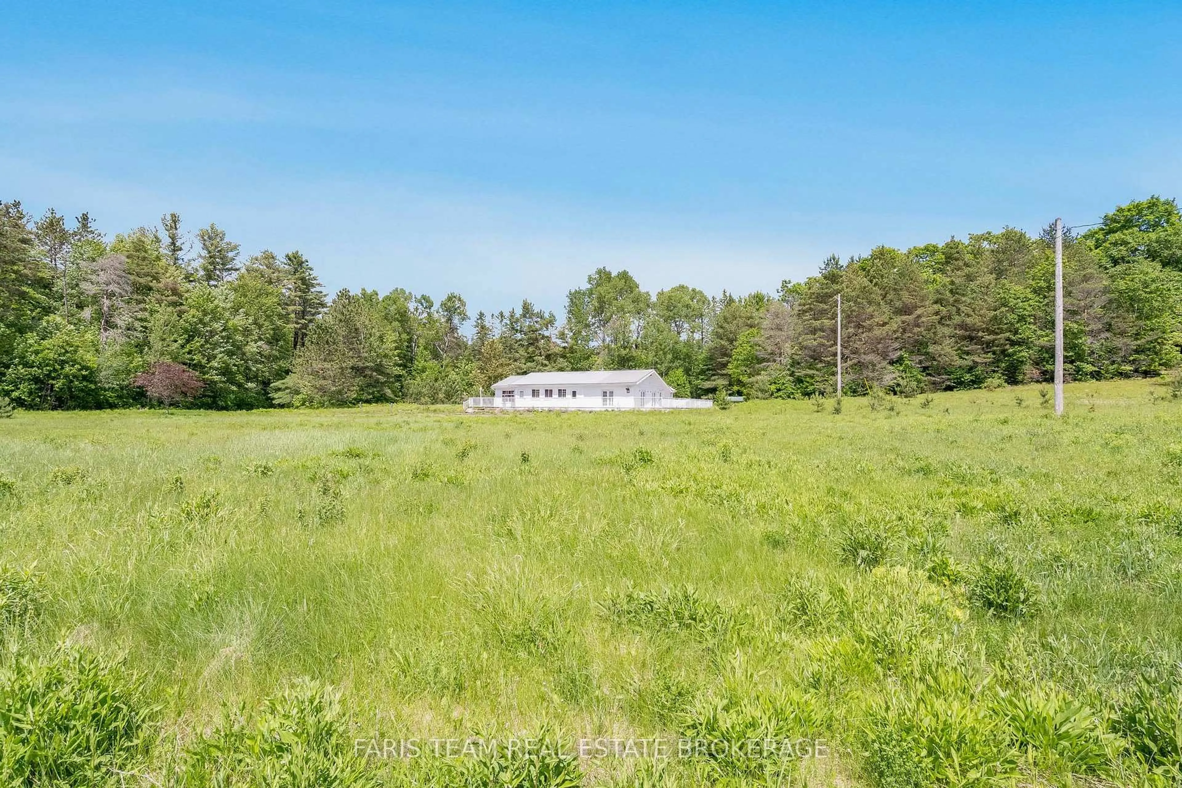 A pic from outside/outdoor area/front of a property/back of a property/a pic from drone, unknown for 2180-2186 Highway 141, Muskoka Lakes Ontario P0B 1L0