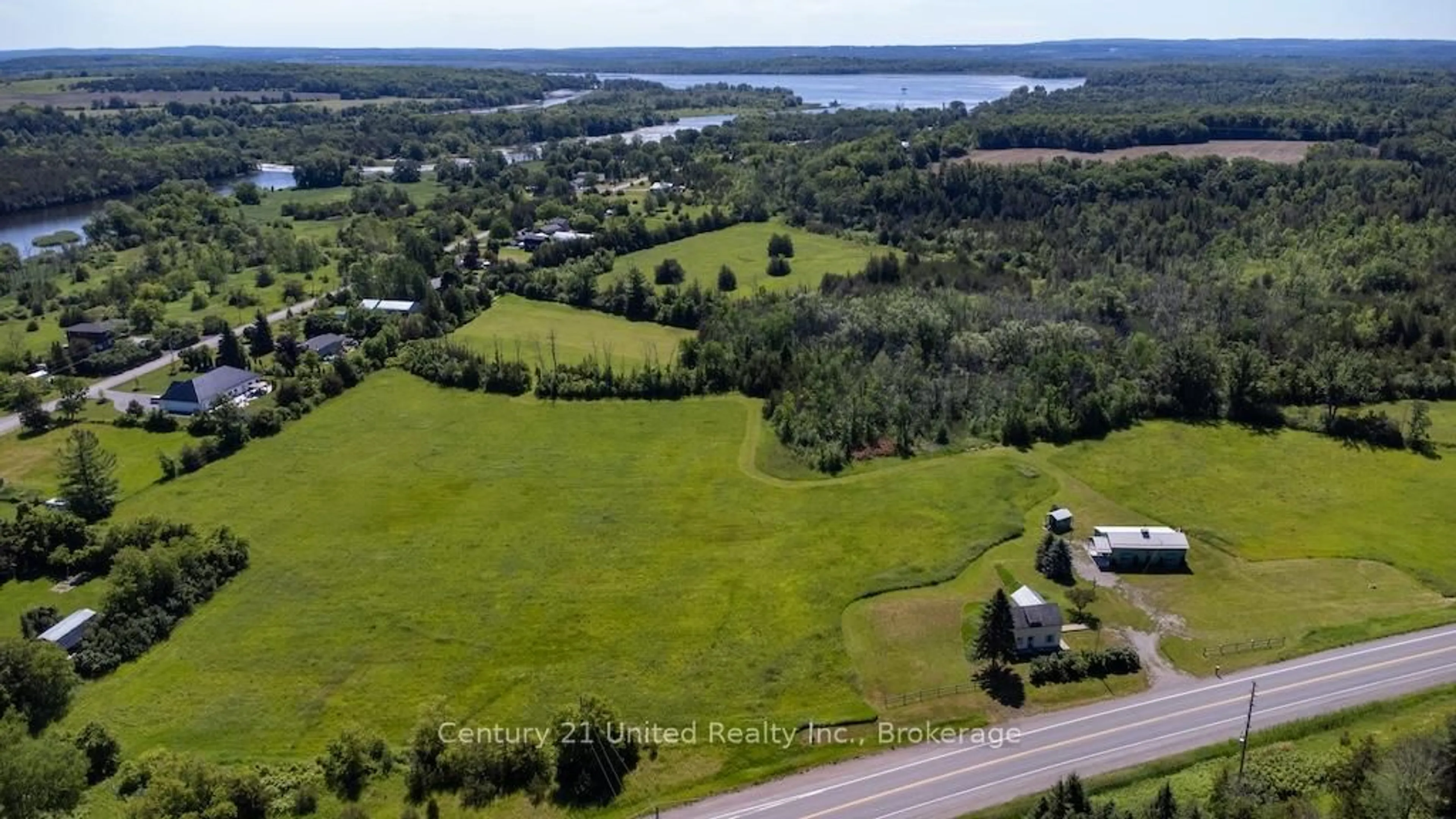 A pic from outside/outdoor area/front of a property/back of a property/a pic from drone, water/lake/river/ocean view for 5050 County Road 30, Trent Hills Ontario K0L 1L0