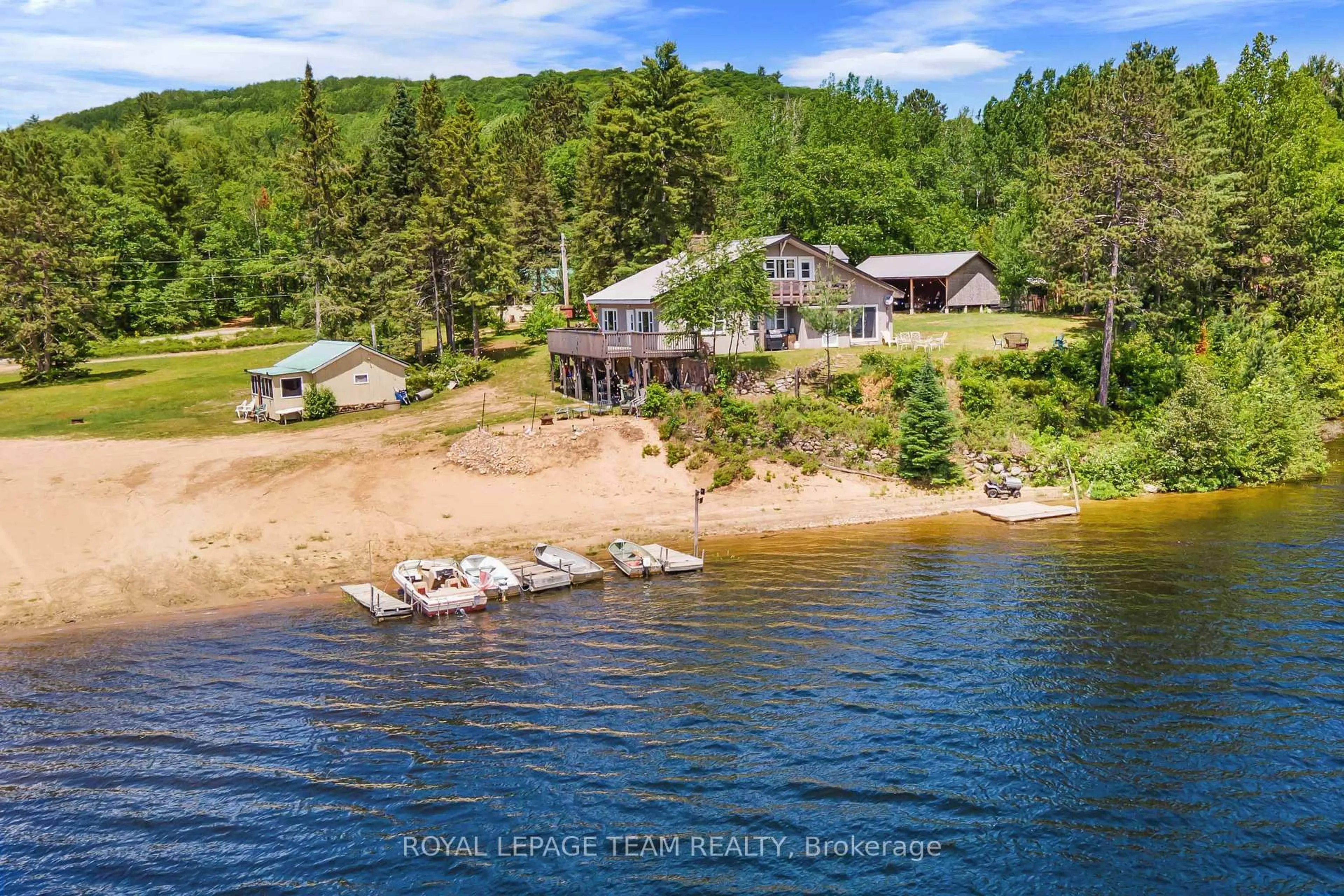 A pic from outside/outdoor area/front of a property/back of a property/a pic from drone, water/lake/river/ocean view for 682 Long Lake Rd, Barry's Bay Ontario K0J 1B0