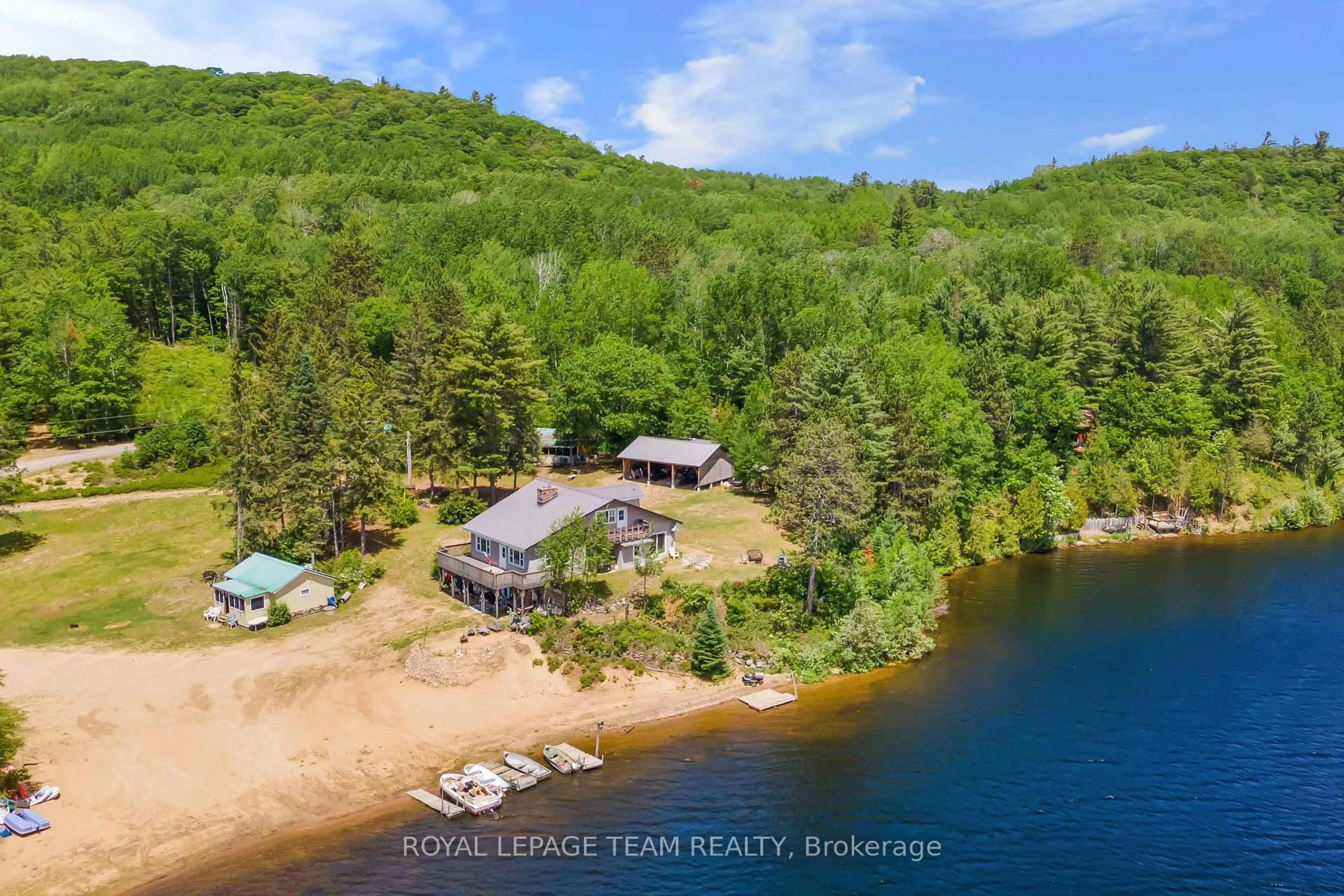 A pic from outside/outdoor area/front of a property/back of a property/a pic from drone, water/lake/river/ocean view for 682 Long Lake Rd, Barry's Bay Ontario K0J 1B0