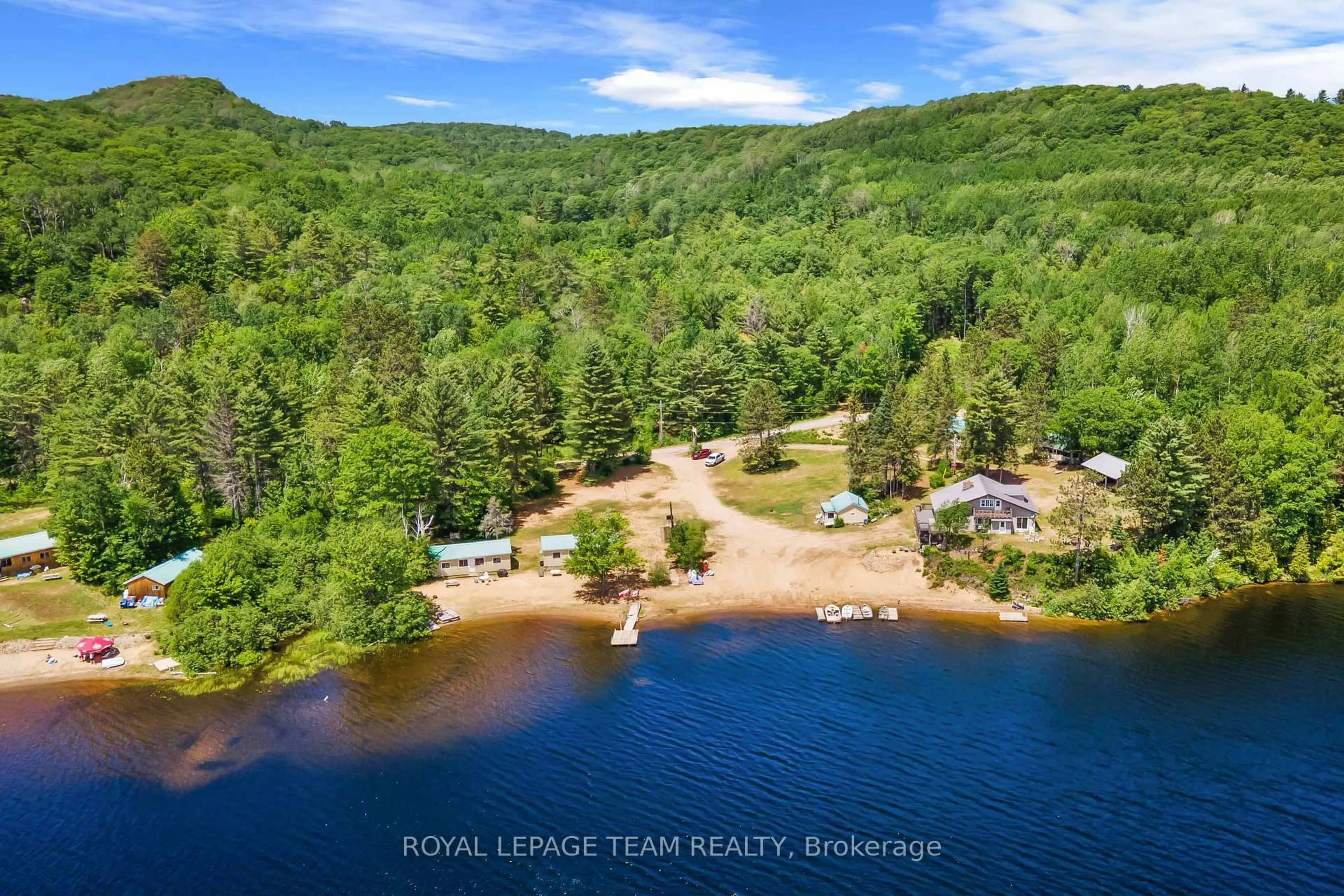 A pic from outside/outdoor area/front of a property/back of a property/a pic from drone, water/lake/river/ocean view for 682 Long Lake Rd, Barry's Bay Ontario K0J 1B0