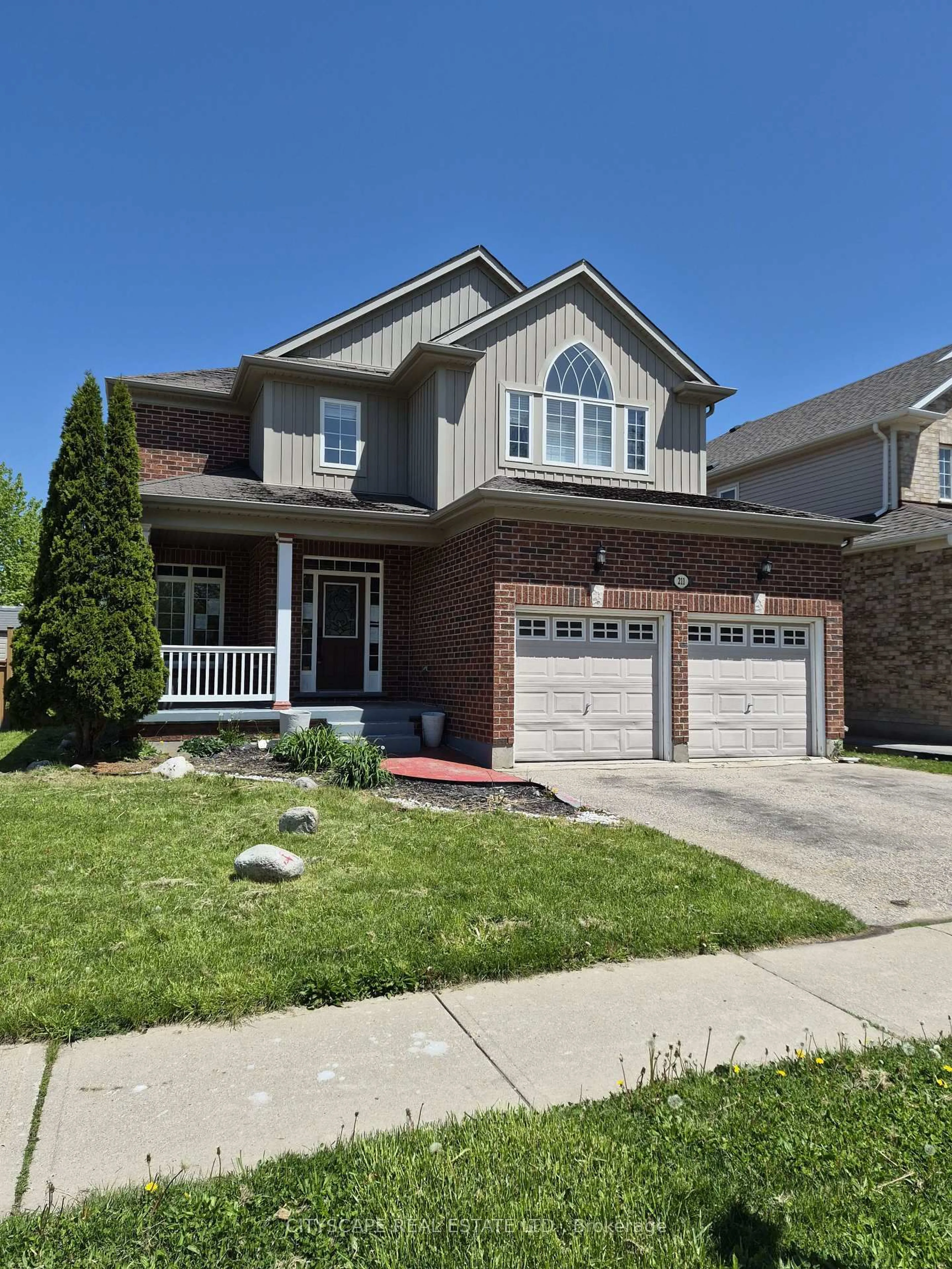 Home with brick exterior material, street for 211 Sims Estate Dr, Kitchener Ontario N2A 4L2