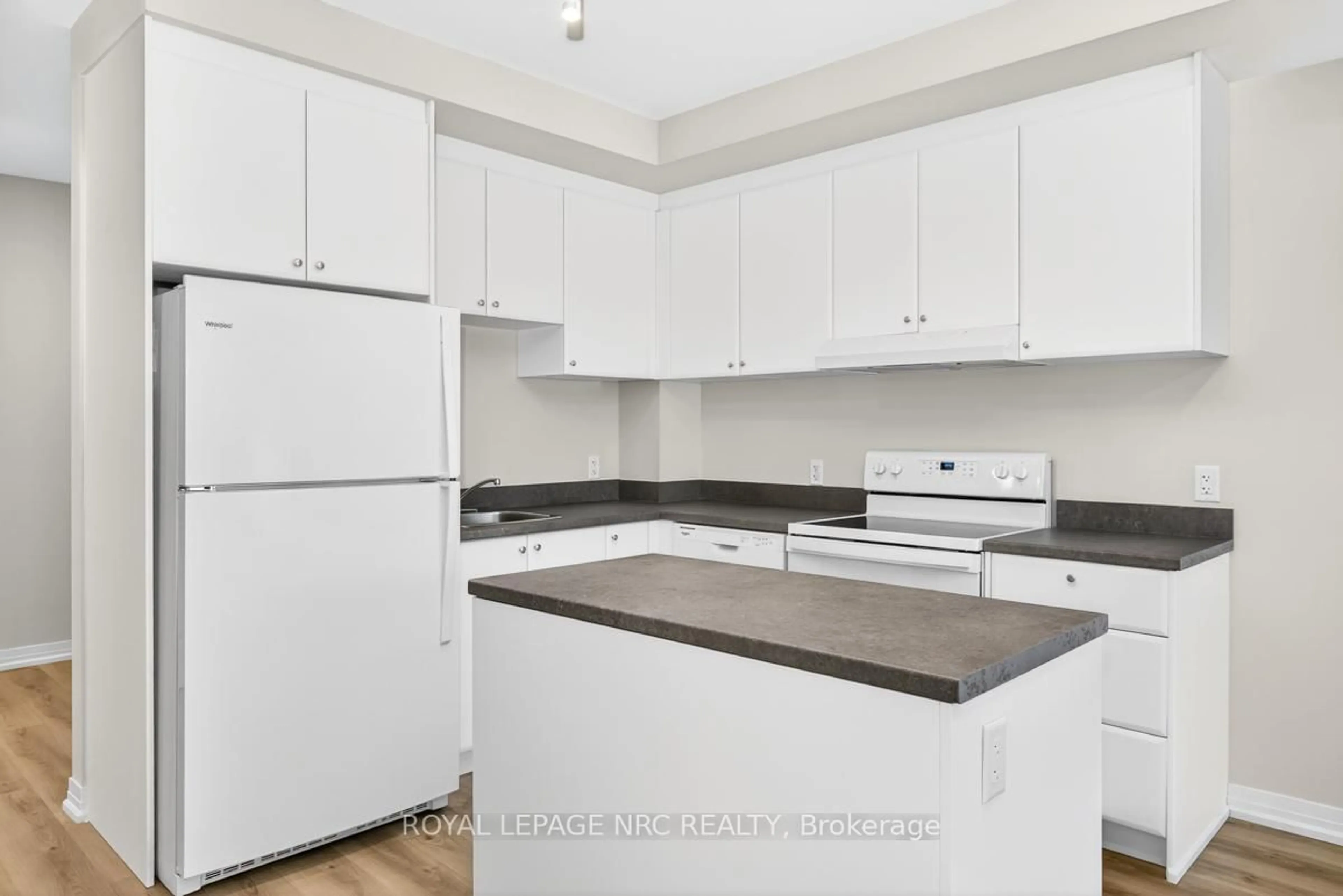 Standard kitchen, wood/laminate floor for 50 HERRICK Ave #121, St. Catharines Ontario L2P 2T9