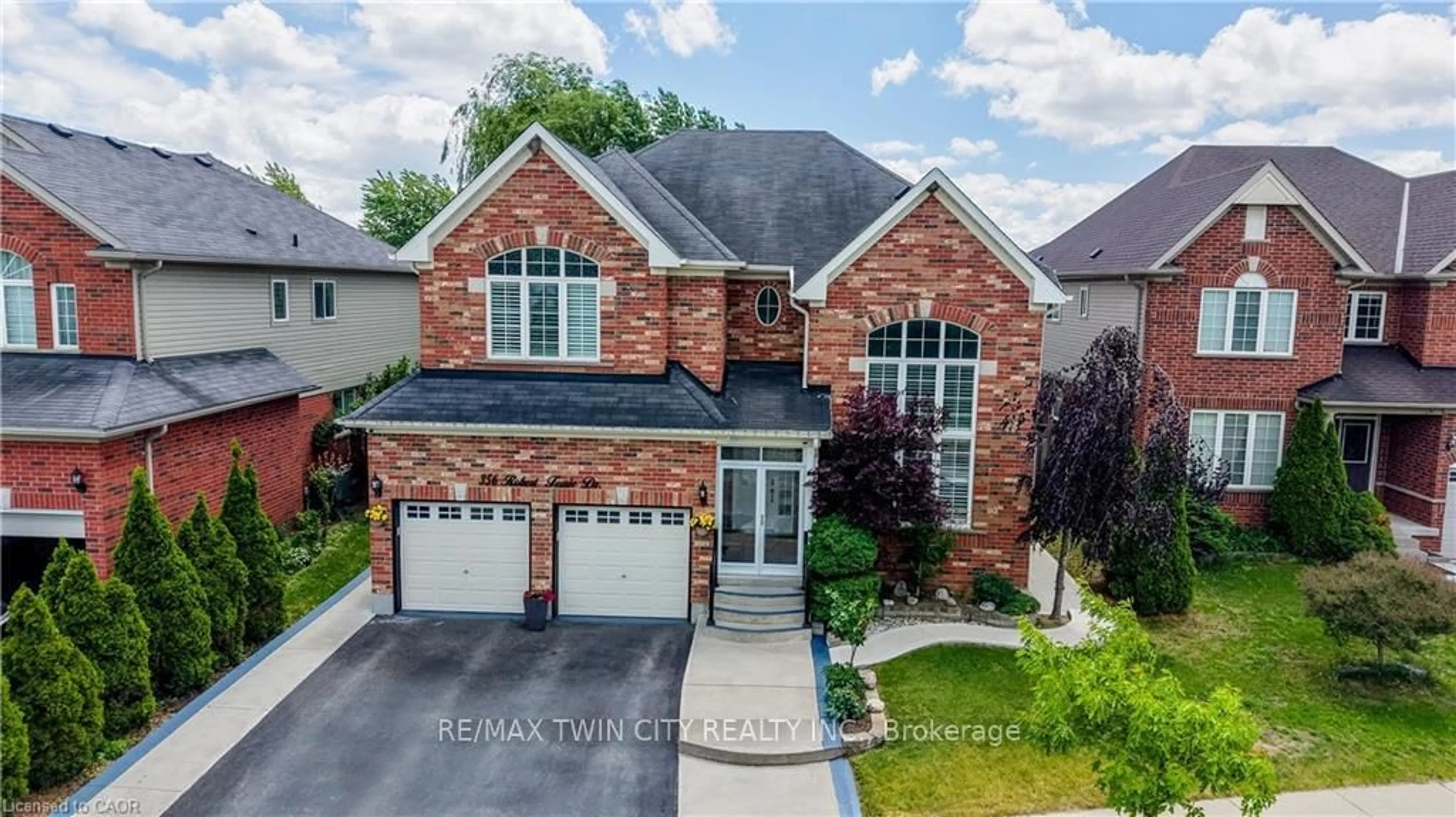 Home with brick exterior material, street for 356 ROBERT FERRIE Dr, Kitchener Ontario N2P 2Y6