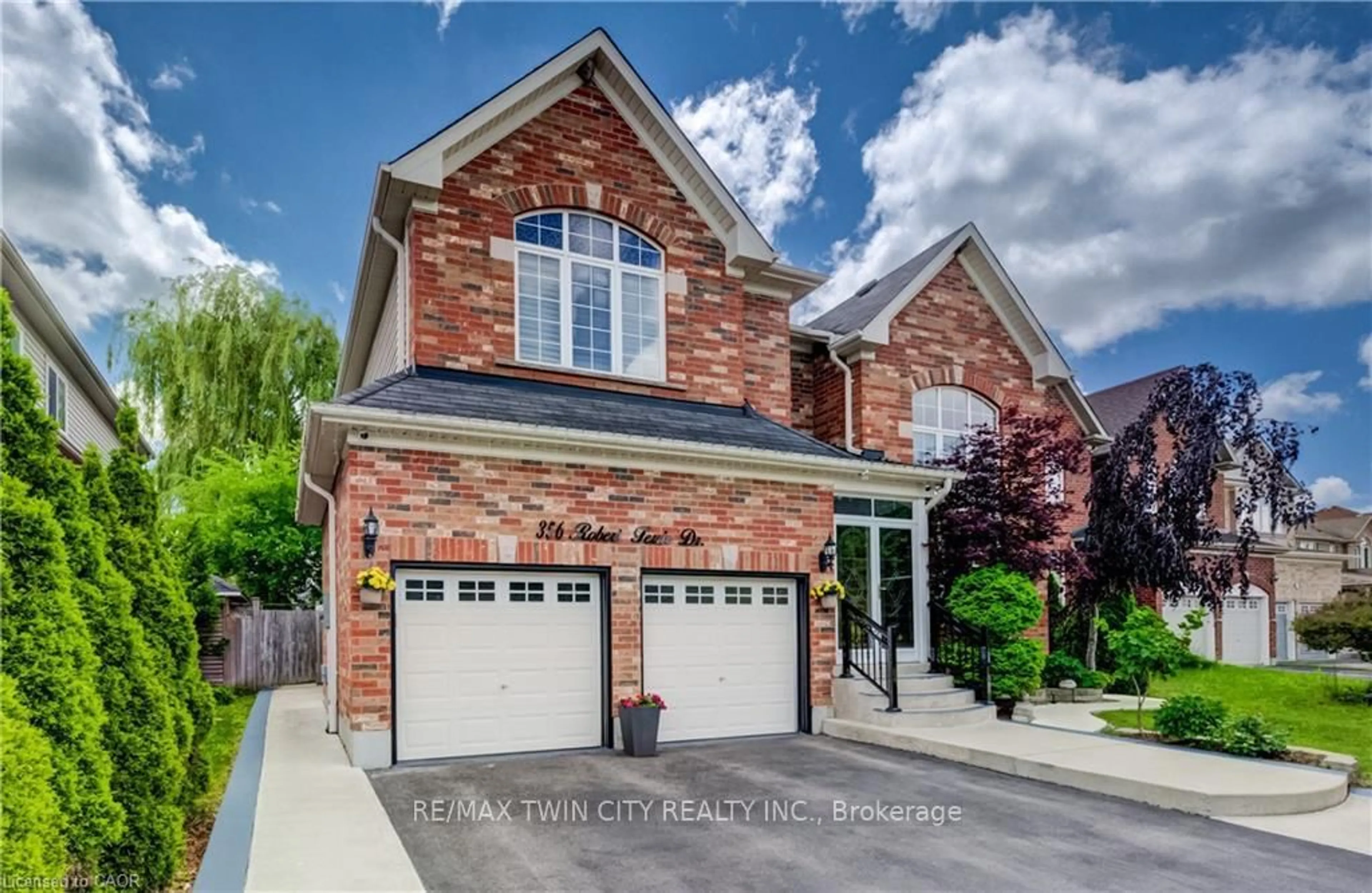 Home with brick exterior material, street for 356 ROBERT FERRIE Dr, Kitchener Ontario N2P 2Y6