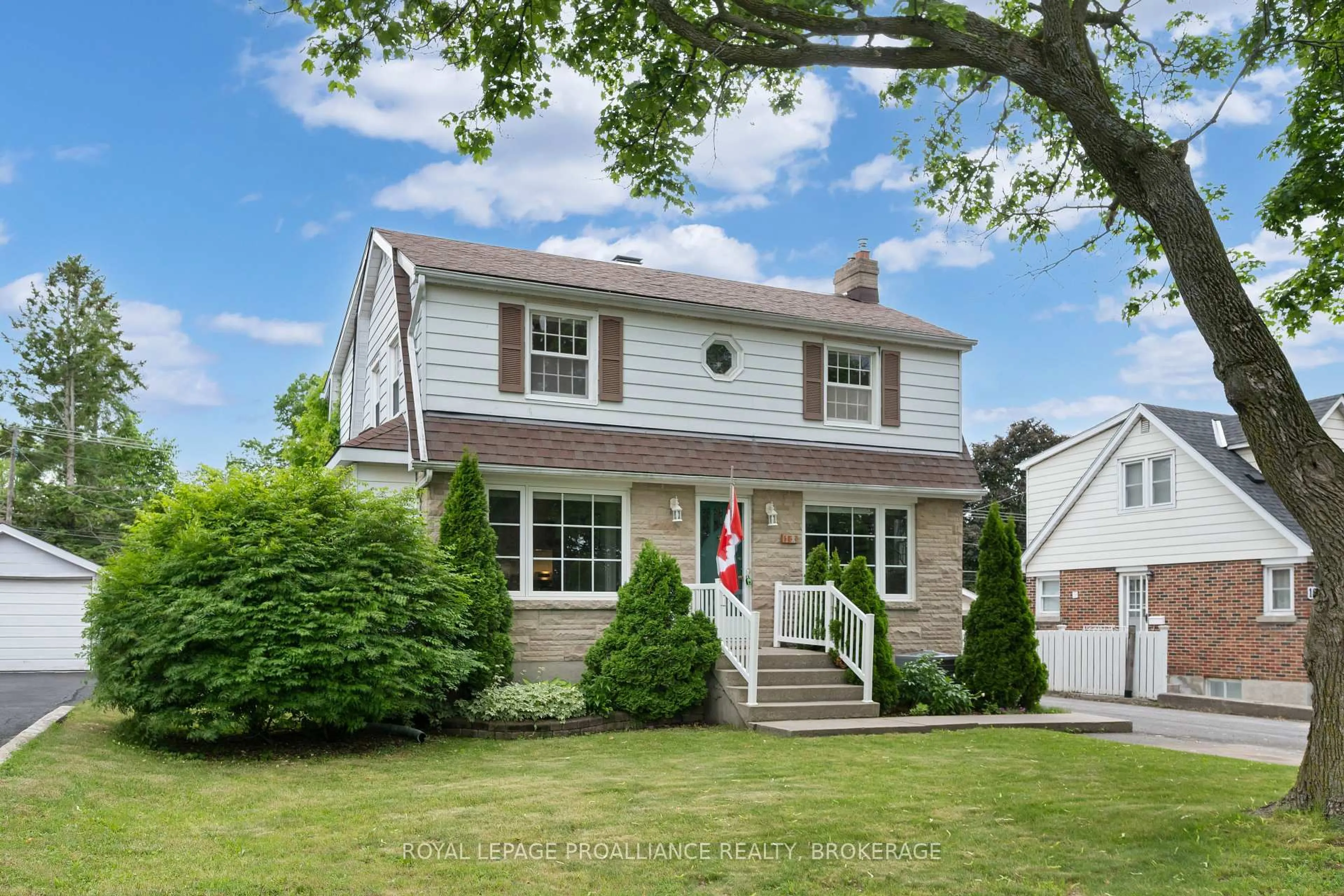 Home with vinyl exterior material, street for 12 Westmoreland Rd, Kingston Ontario K7M 1J5