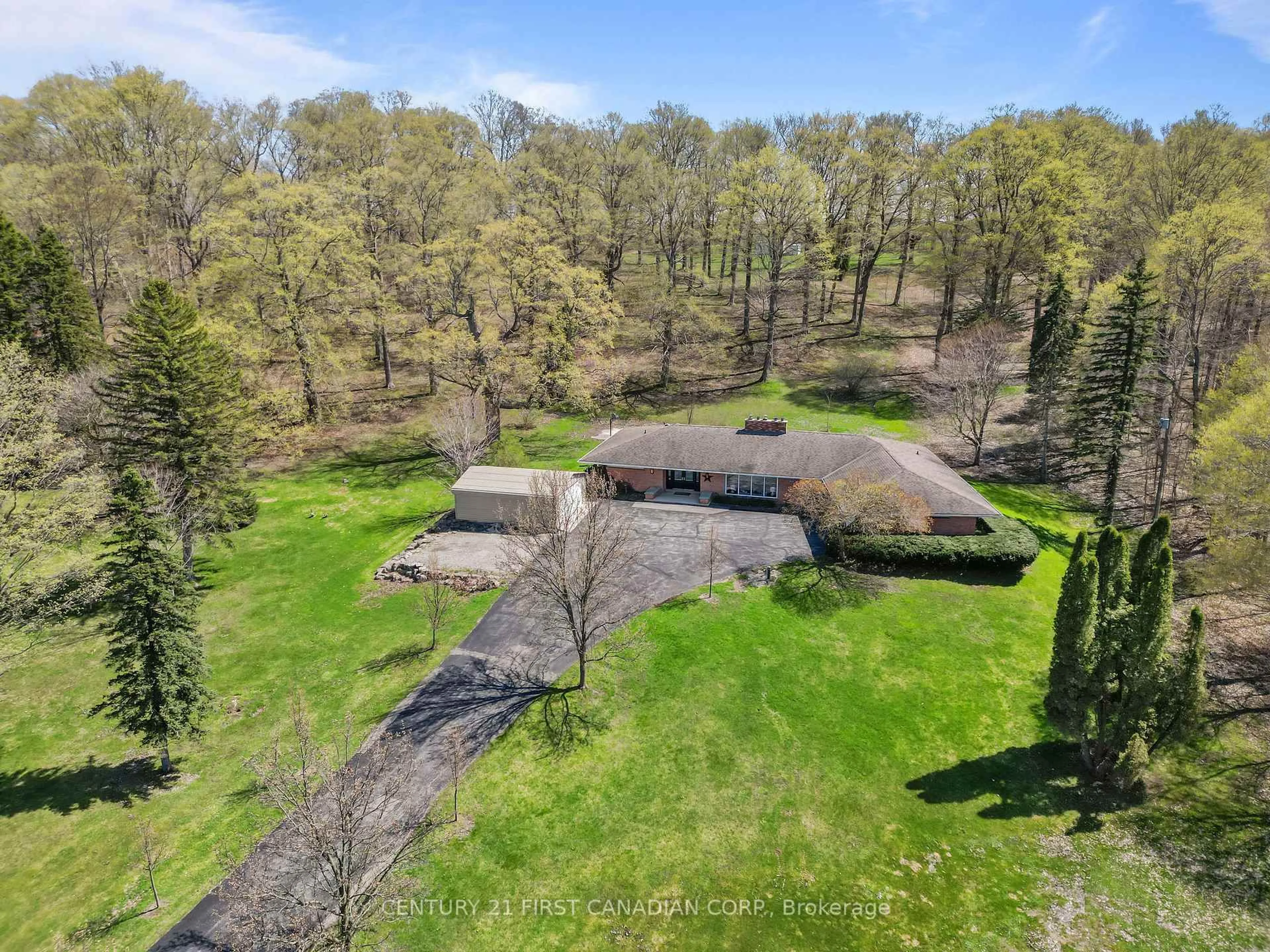 A pic from outside/outdoor area/front of a property/back of a property/a pic from drone, forest/trees view for 14519 Elginfield Rd, Middlesex Centre Ontario N0M 2J0