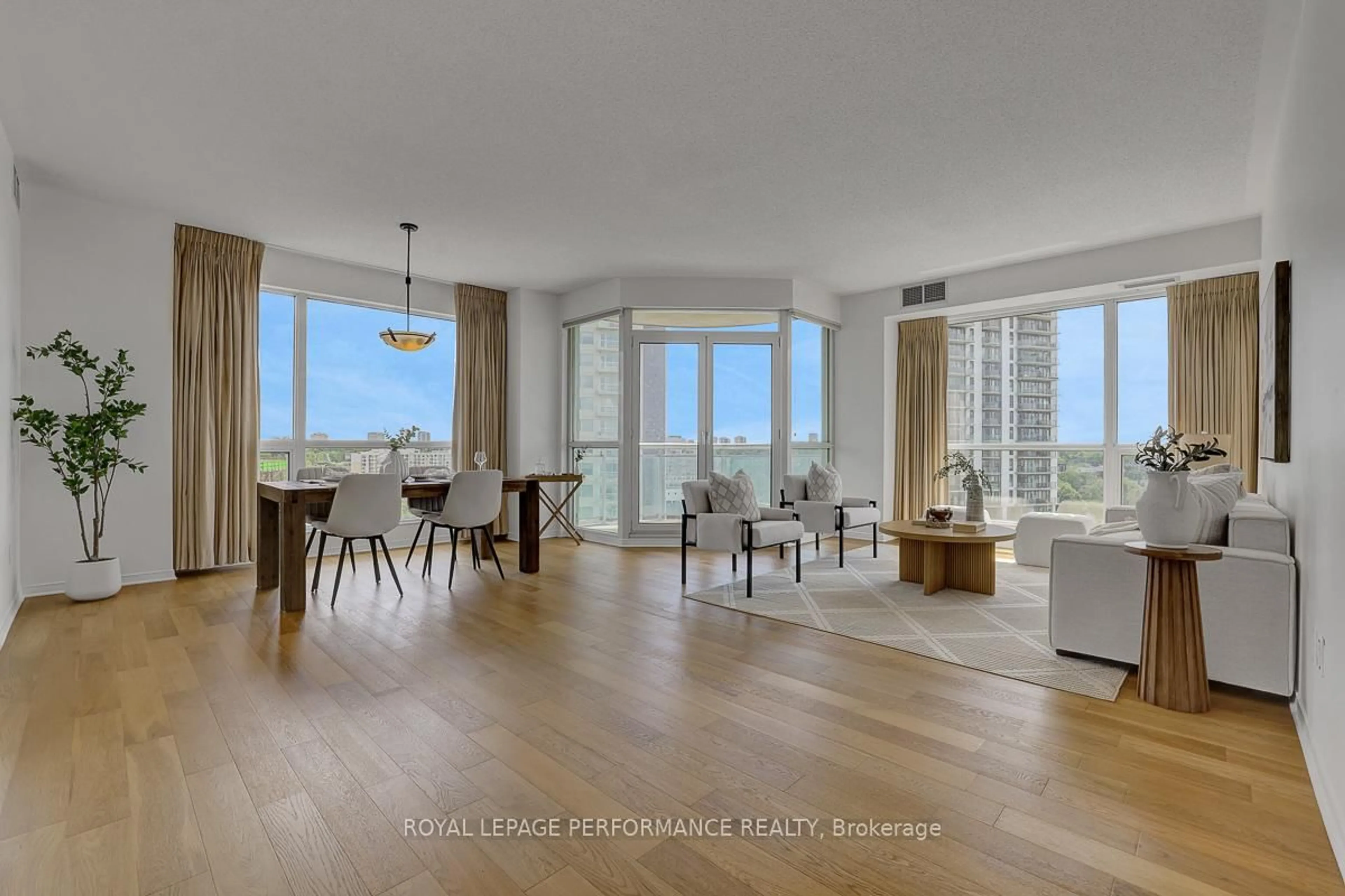 Living room with furniture, wood/laminate floor for 38 Metropole Private #1101, Ottawa Ontario K1Z 1E9