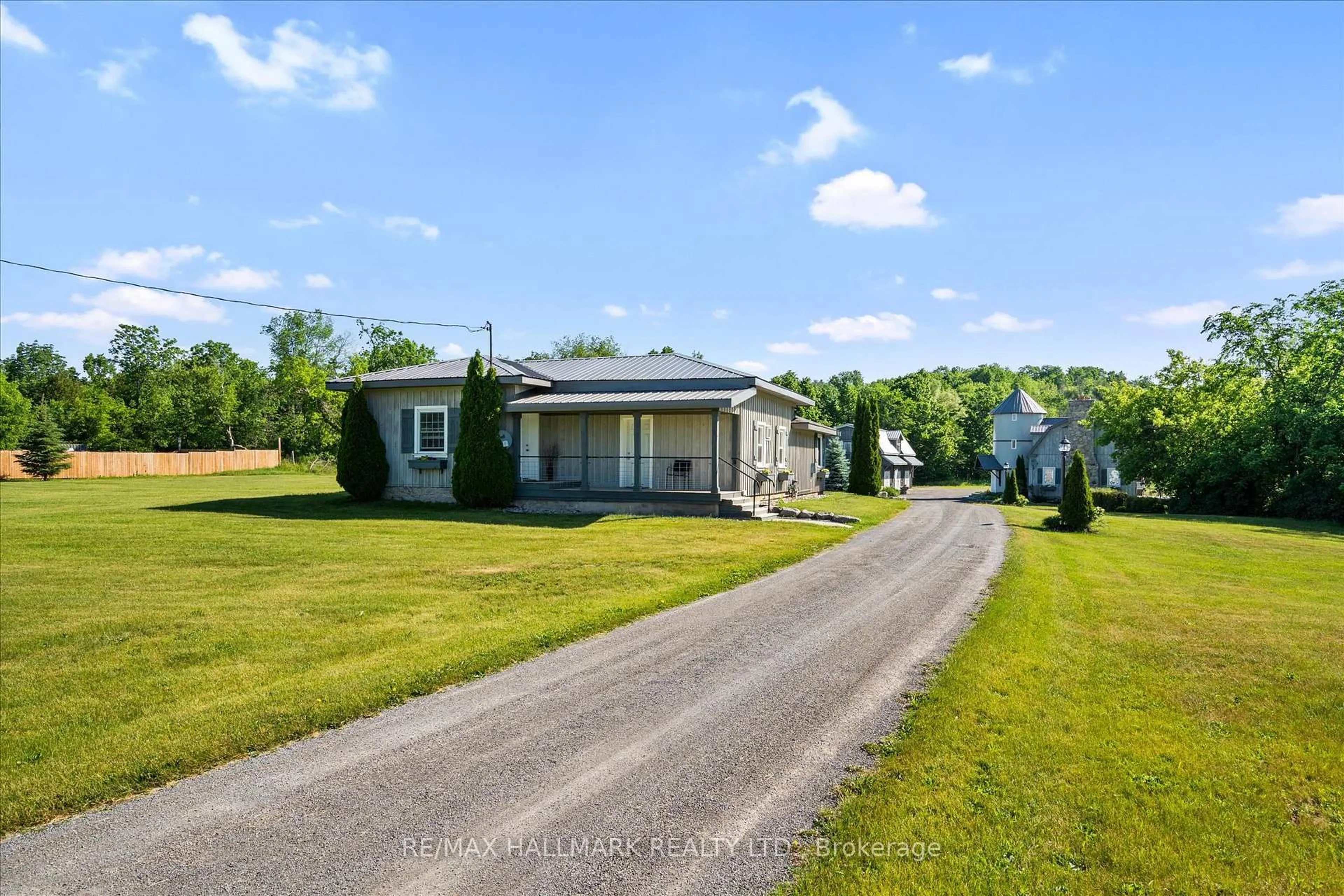 A pic from outside/outdoor area/front of a property/back of a property/a pic from drone, street for 105 County Rd 40 Rd, Asphodel-Norwood Ontario K0L 2V0