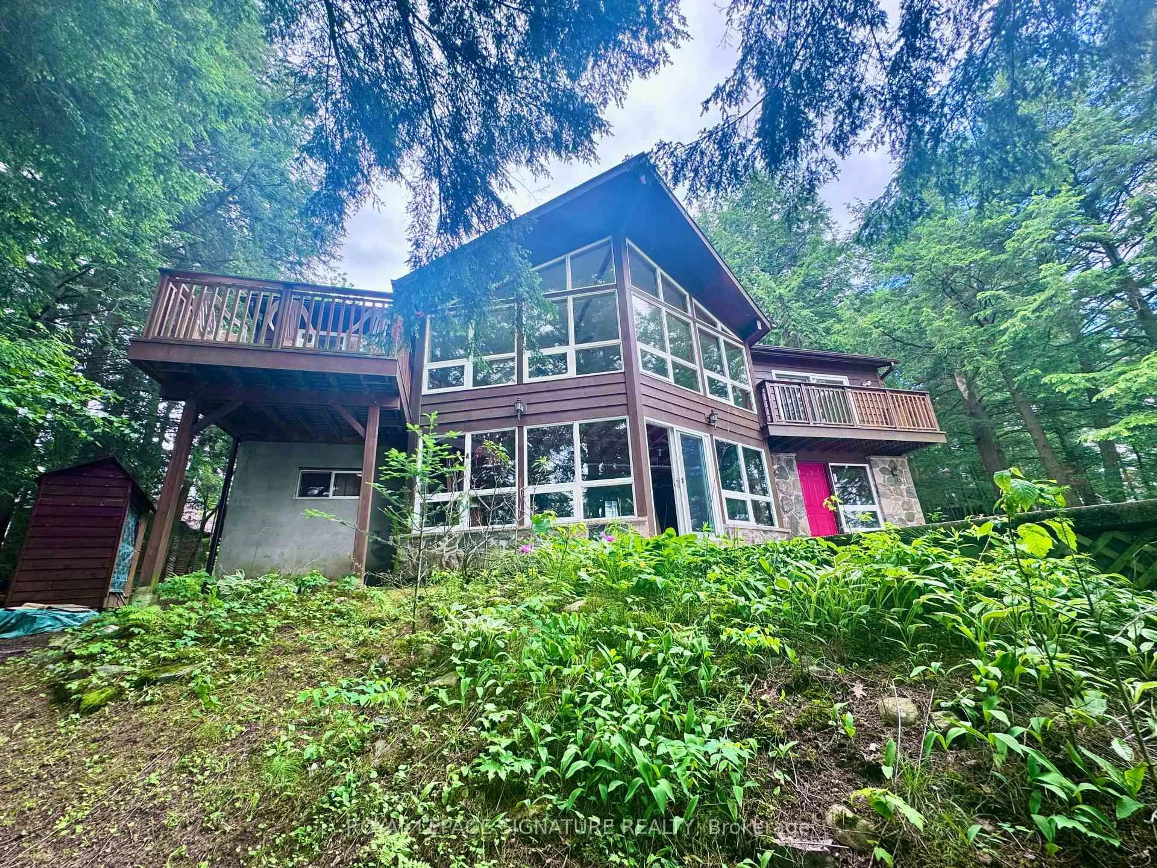A pic from outside/outdoor area/front of a property/back of a property/a pic from drone, unknown for 1295 Beaverdam Tr, Minden Hills Ontario K0M 2K0