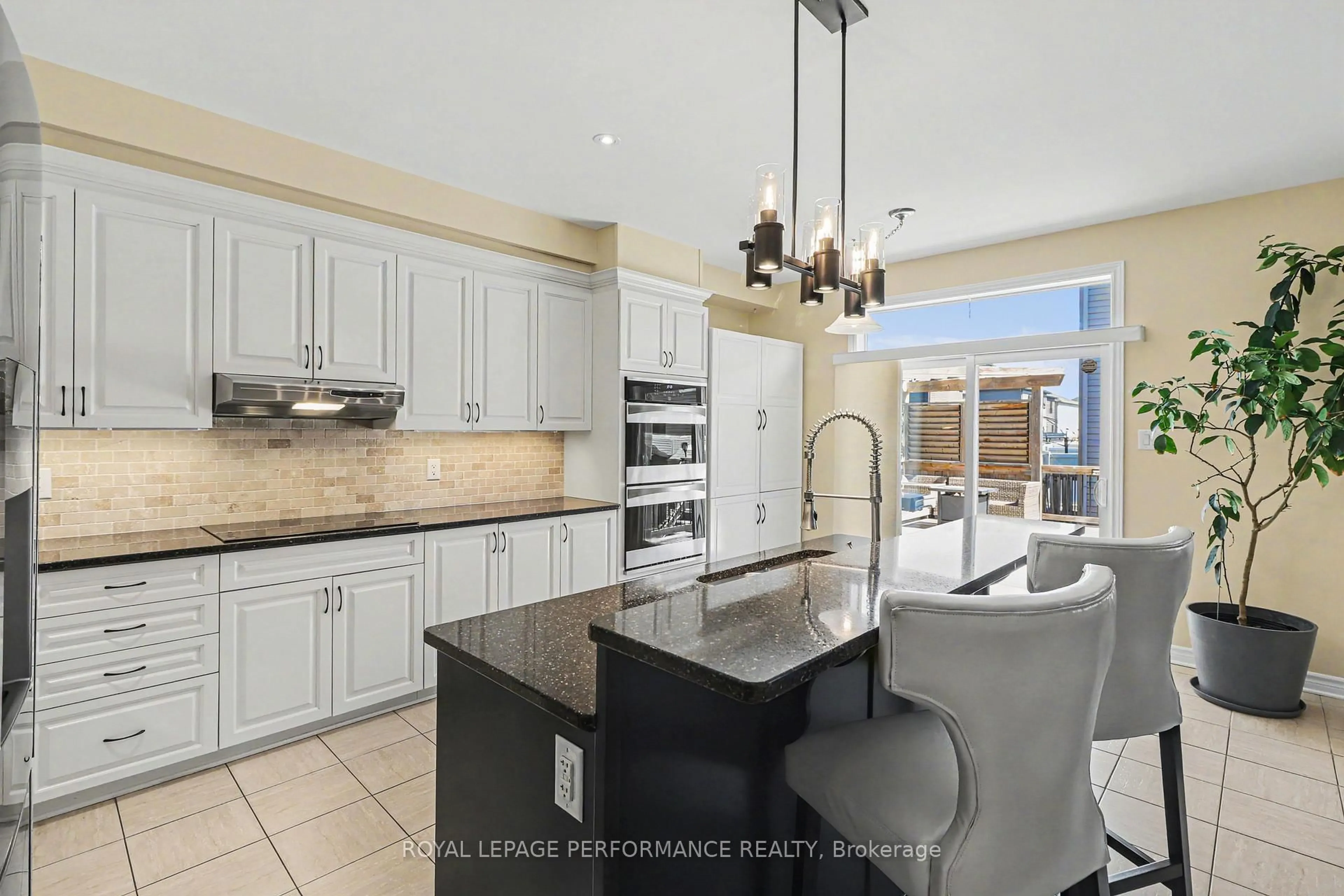 Open concept kitchen, ceramic/tile floor for 717 Magnolia St, Ottawa Ontario K4A 0Z2