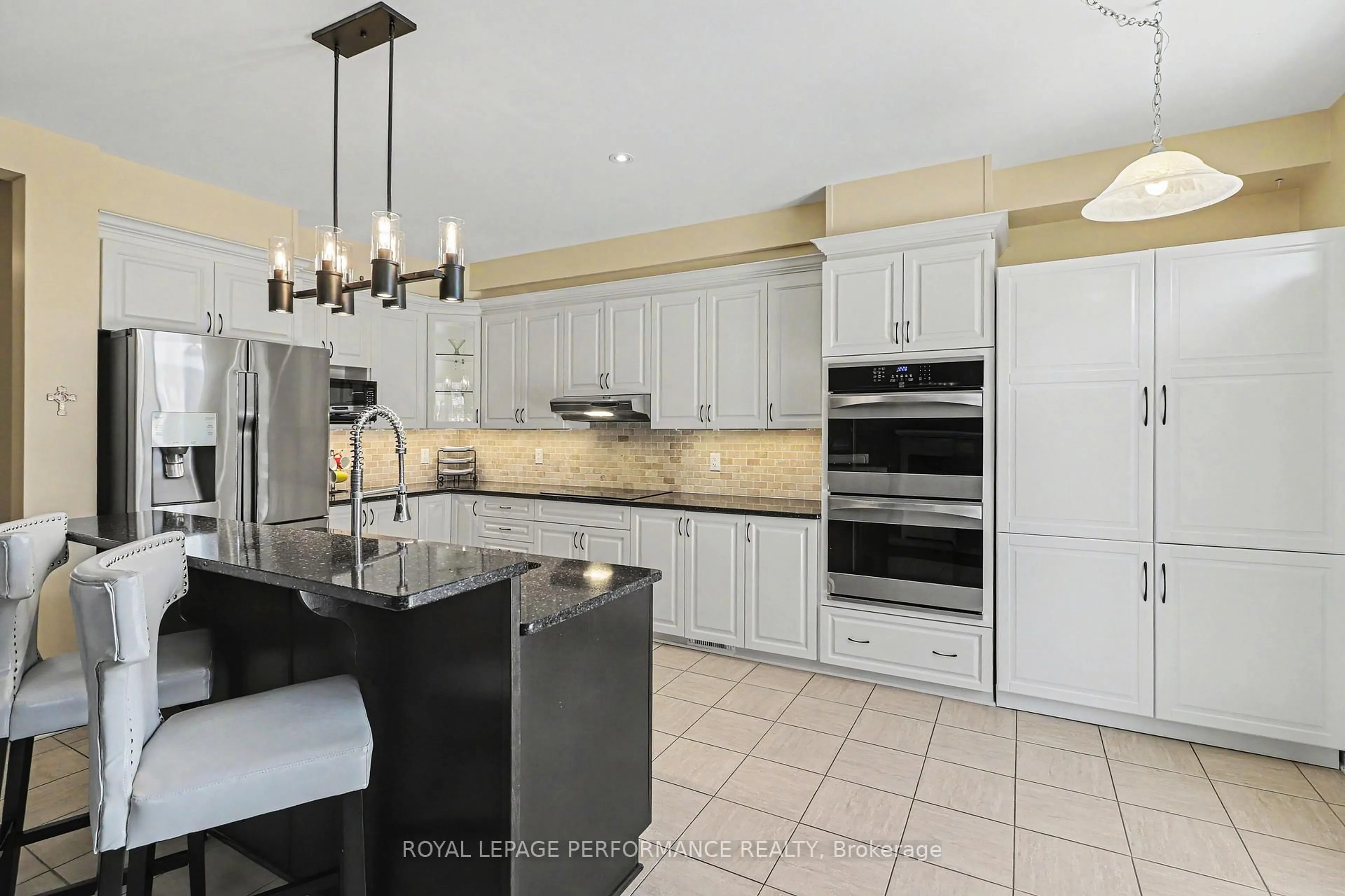 Open concept kitchen, ceramic/tile floor for 717 Magnolia St, Ottawa Ontario K4A 0Z2
