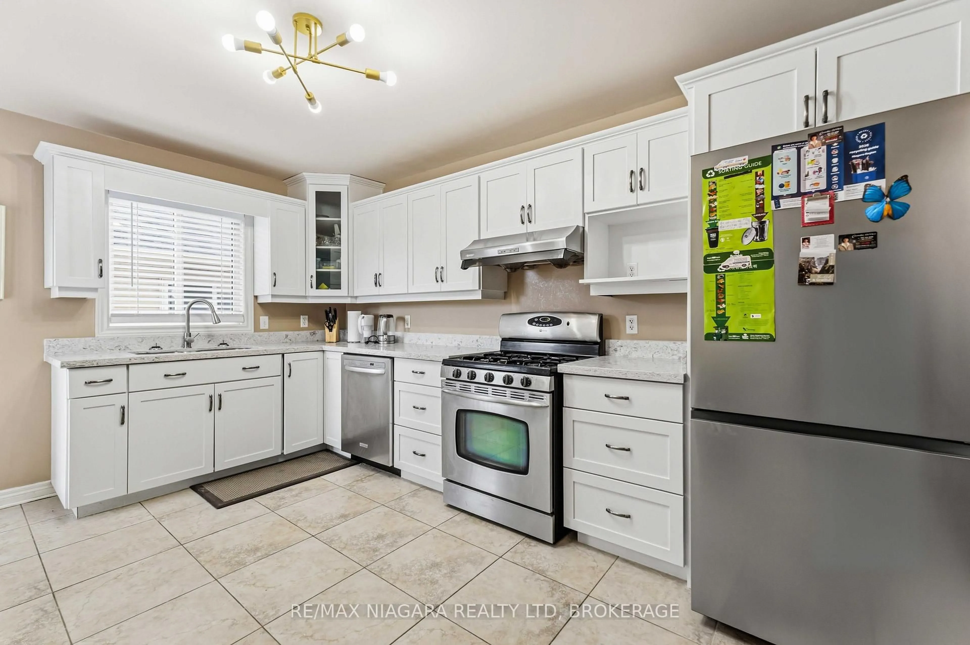 Open concept kitchen, ceramic/tile floor for 8340 Racey Ave, Niagara Falls Ontario L2H 3M7