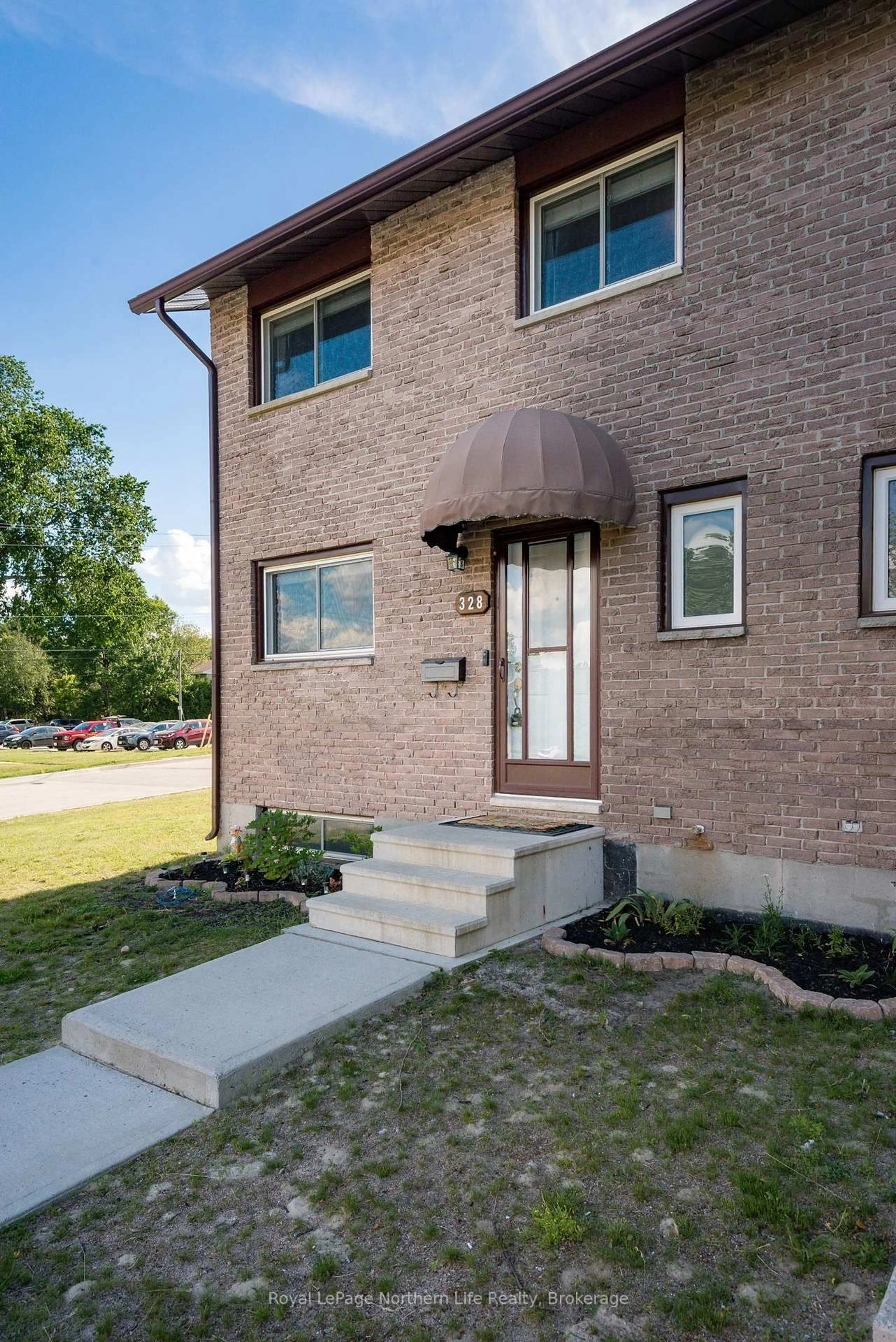 Home with brick exterior material, street for 328 Wickstead Ave #1, North Bay Ontario P1A 3L8