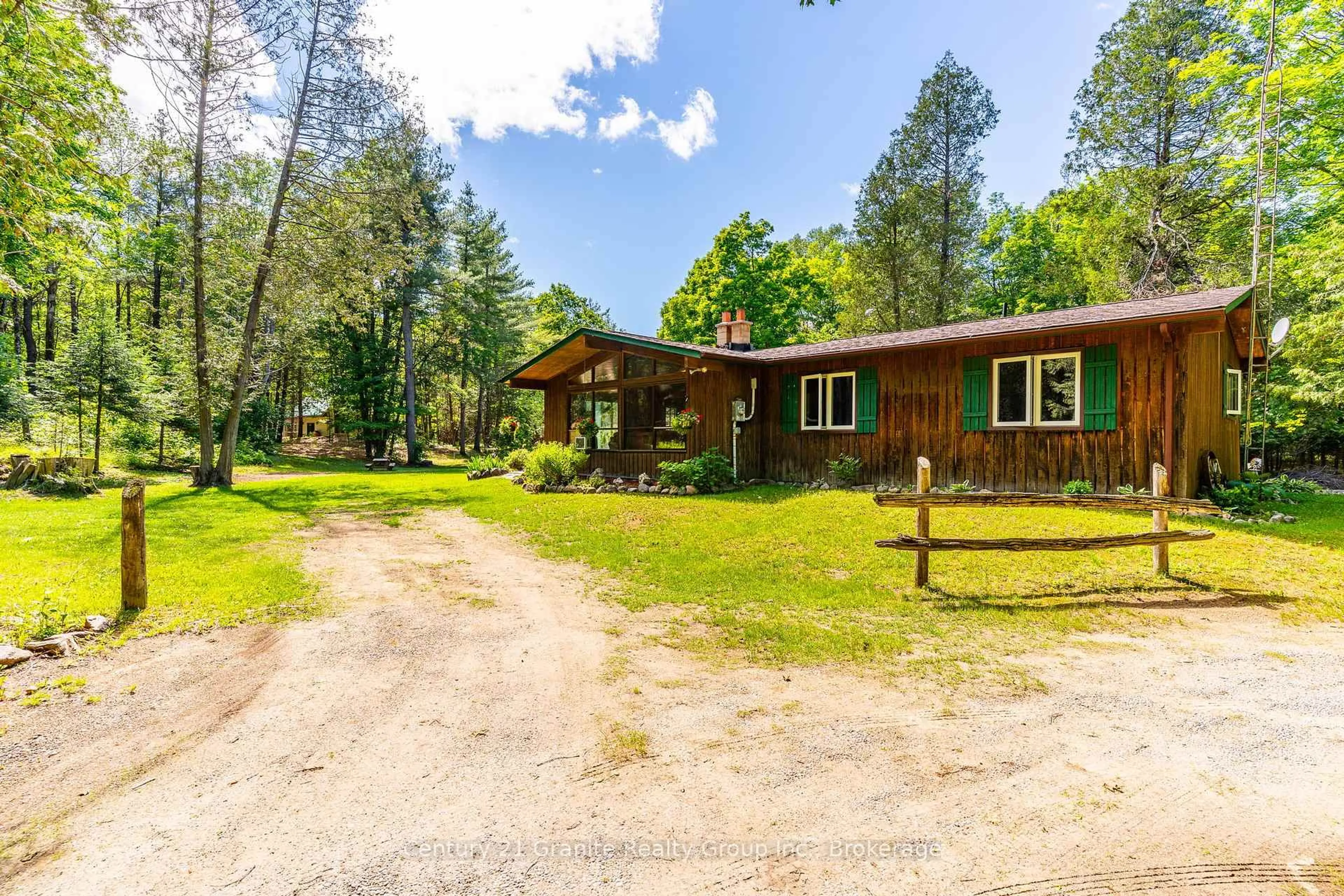 A pic from outside/outdoor area/front of a property/back of a property/a pic from drone, unknown for 1069 Rice Rd, Minden Hills Ontario K0M 1K0