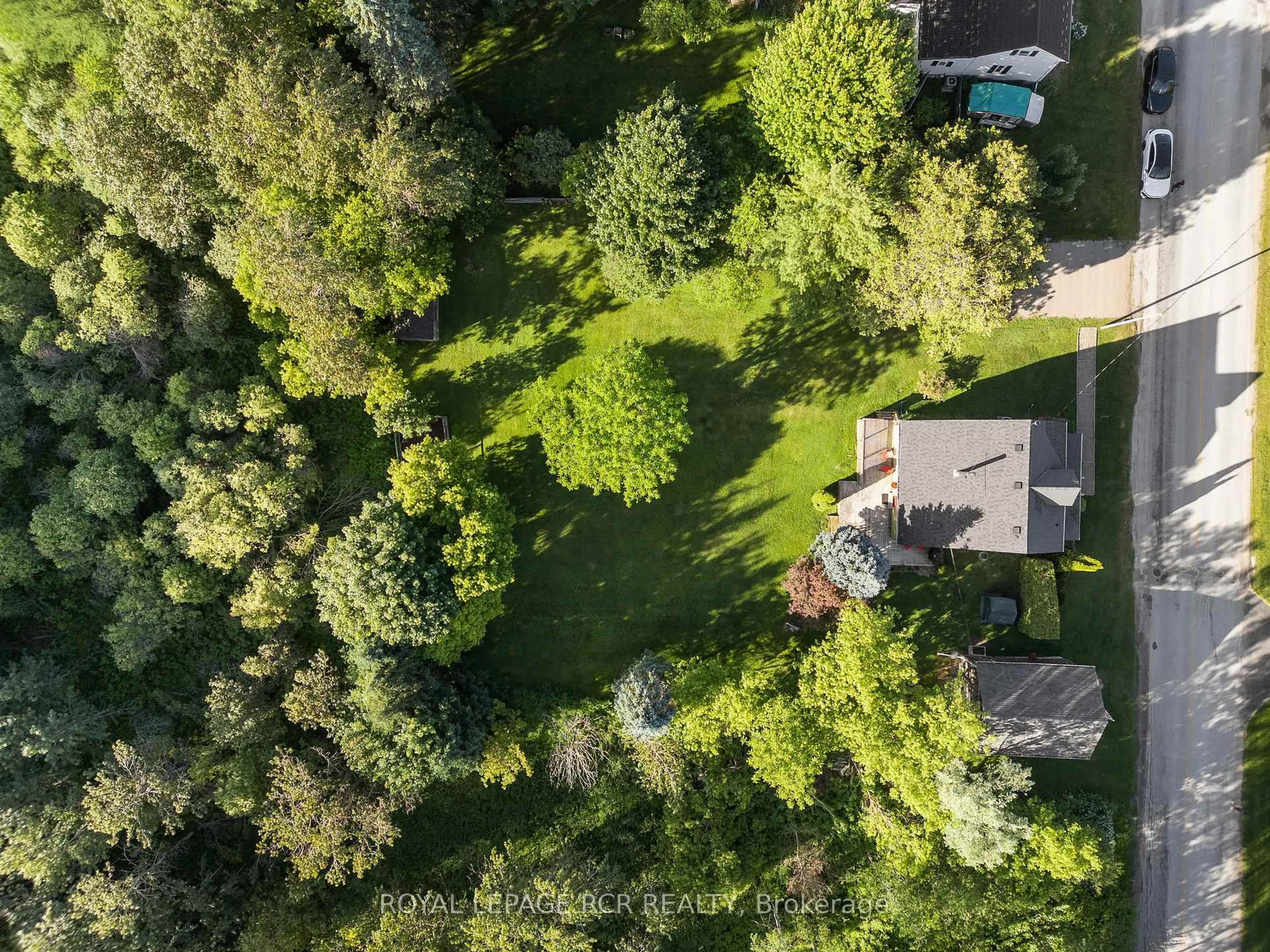 A pic from outside/outdoor area/front of a property/back of a property/a pic from drone, forest/trees view for 022021 E Gara-Erin Townline, East Garafraxa Ontario L9W 7G4