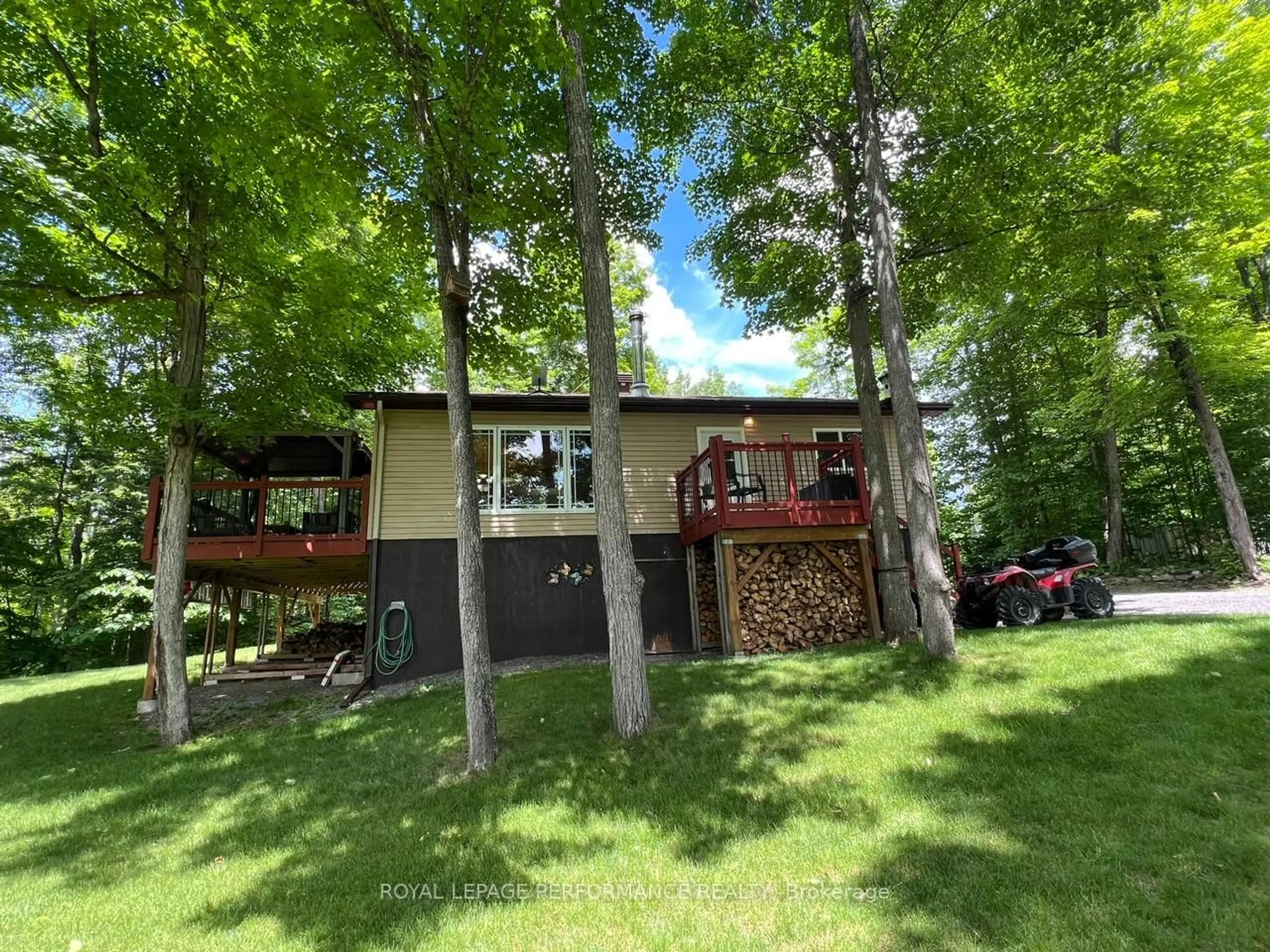 A pic from outside/outdoor area/front of a property/back of a property/a pic from drone, forest/trees view for 253 LACOURSE Lane, White Lake Ontario K0A 3L0